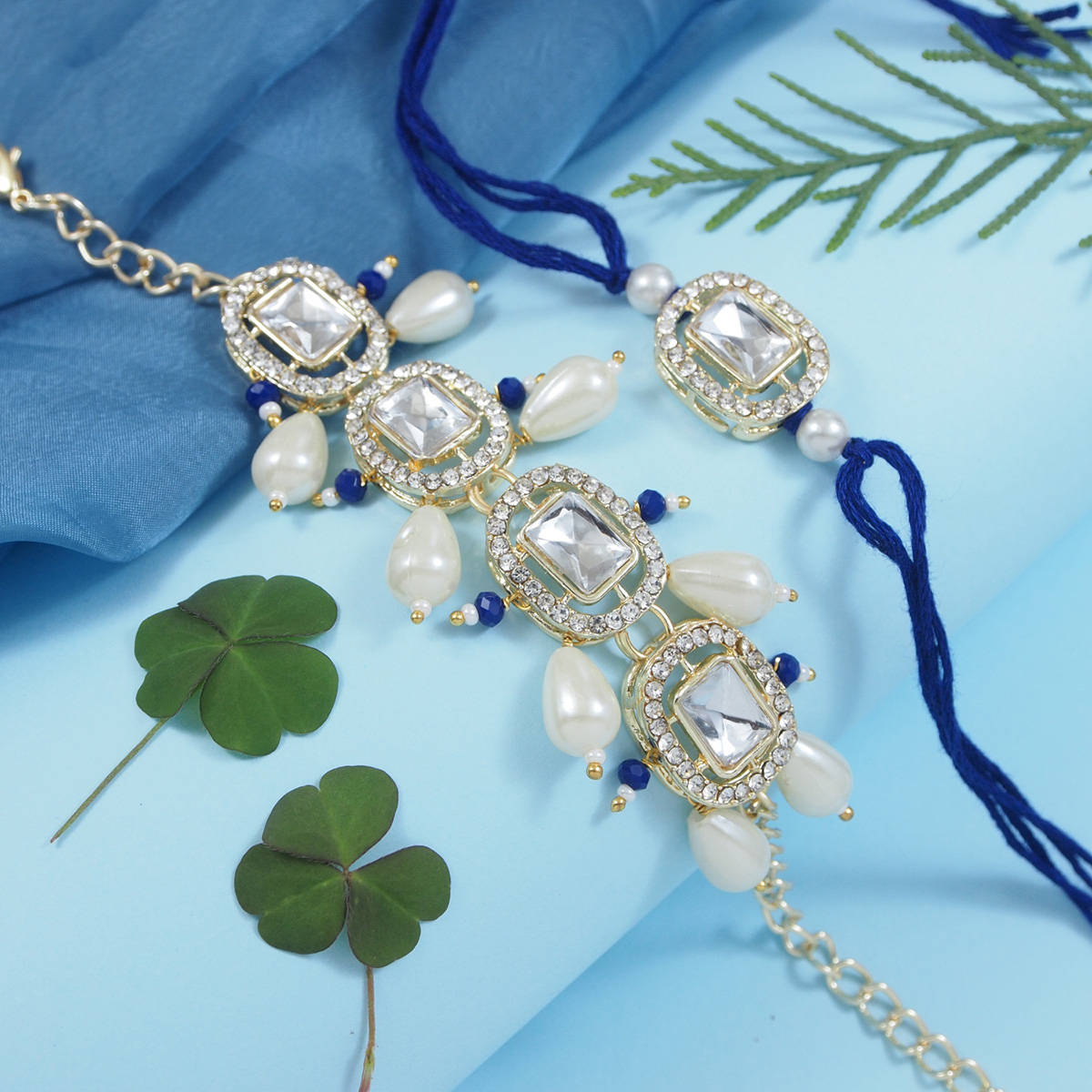 I Jewels Blue Kundan & Pearl Bhaiya Bhabhi Rakhi & Bracelet with Roli Chawal