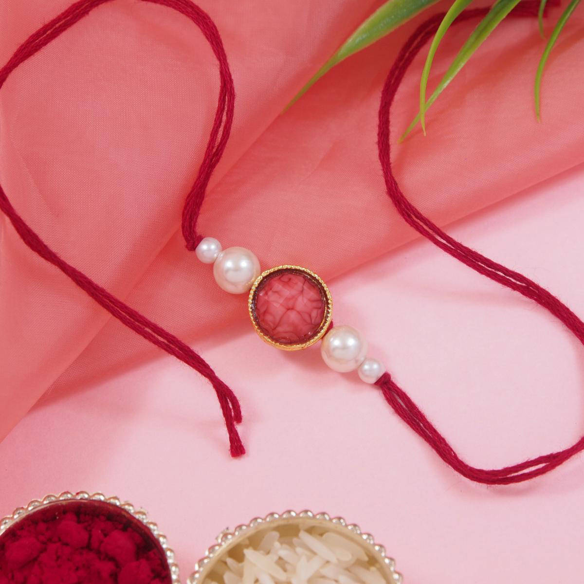 I Jewels Red Designer Pearl Beaded Bhaiya Rakhi with Roli Chawal & Rakshabandhan Card
