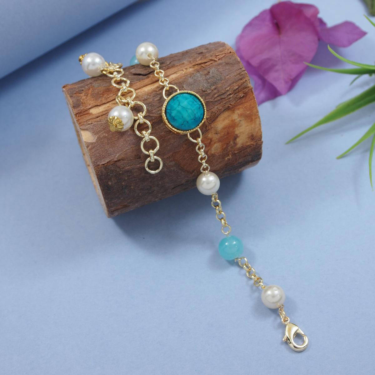 I Jewels Turquoise Round Shaped Kundan & Pearl Bracelet Rakhi with Roli Chawal
