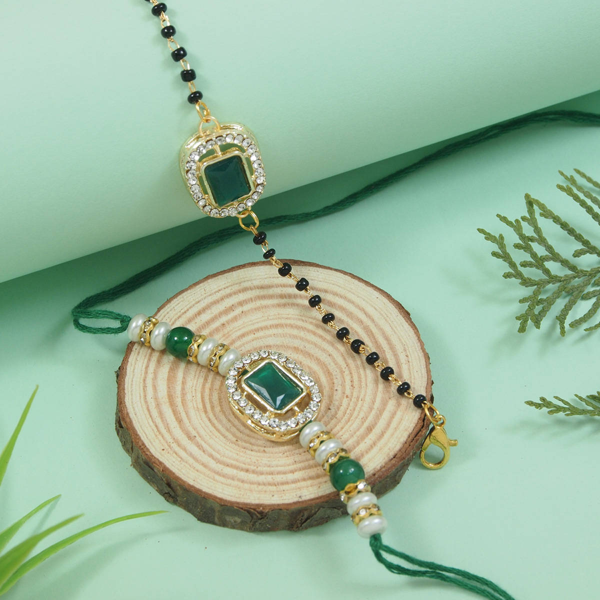 I Jewels Green Kundan Pearl Bhaiya Bhabhi Rakhi & Mangalsutra Bracelet with Roli Chawal