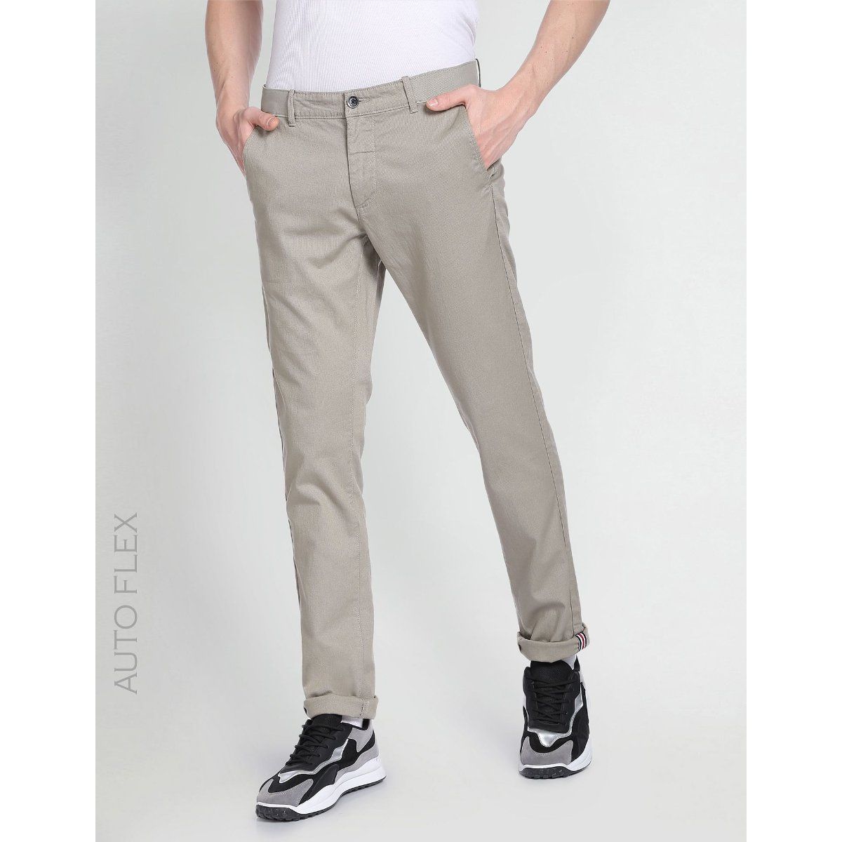 Buy Arrow Khaki Brown Tapered Fit Autoflex Formal Trousers on Myntra |  PaisaWapas.com