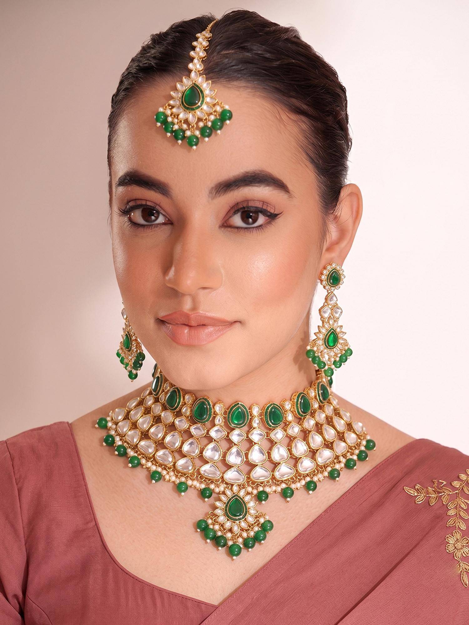 Peora Gold Plated Kundan Necklace Set with Green Stones Earrings and Maang Tikka