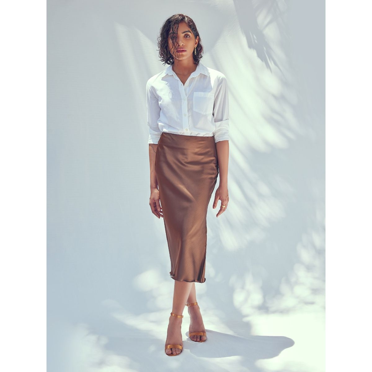 Black  Brown  Faux Leather Skirt  Blue Sweater  Olivia Jeanette
