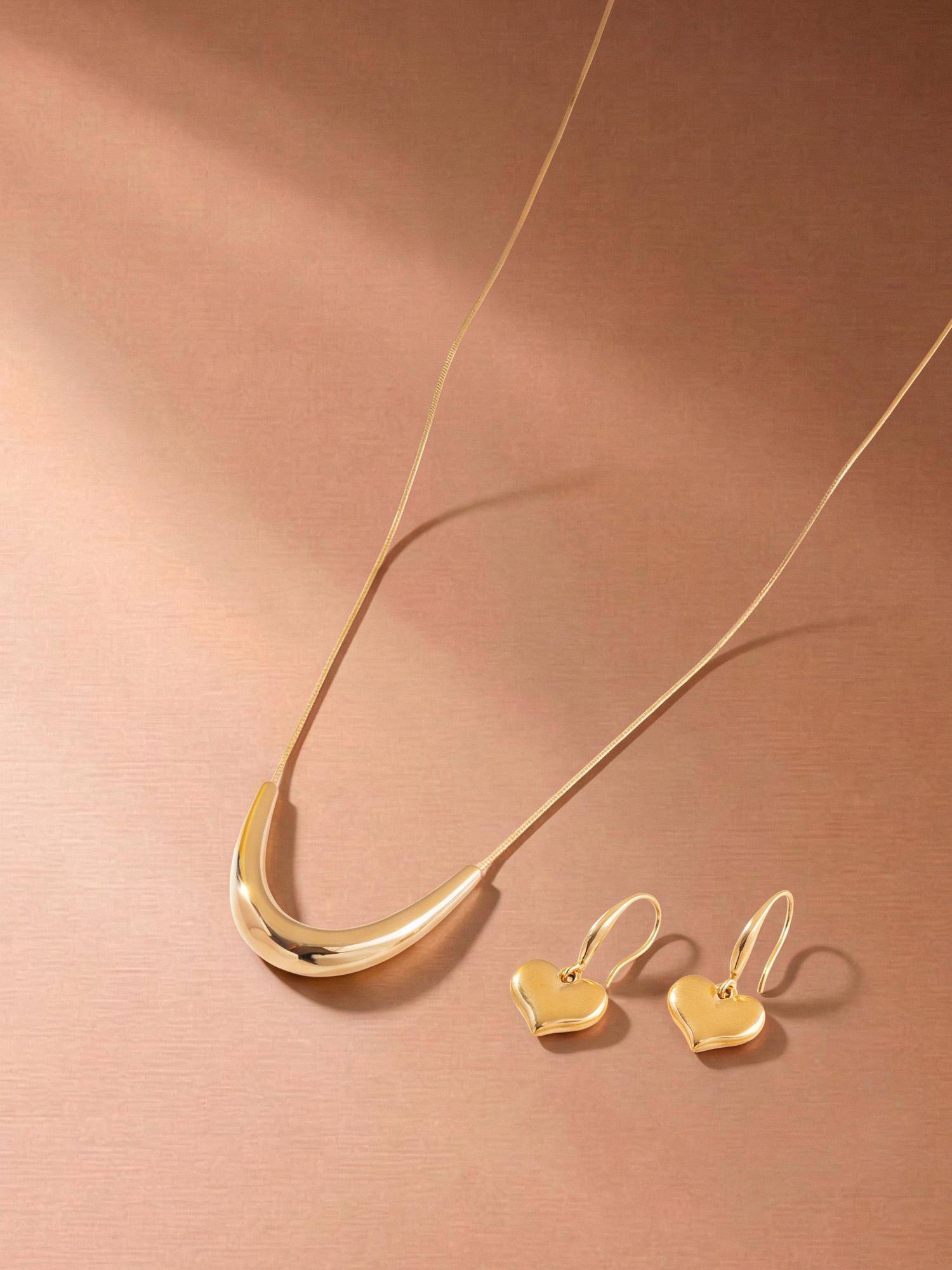 Palmonas Women Gold Arc and Heart Jewellery Set