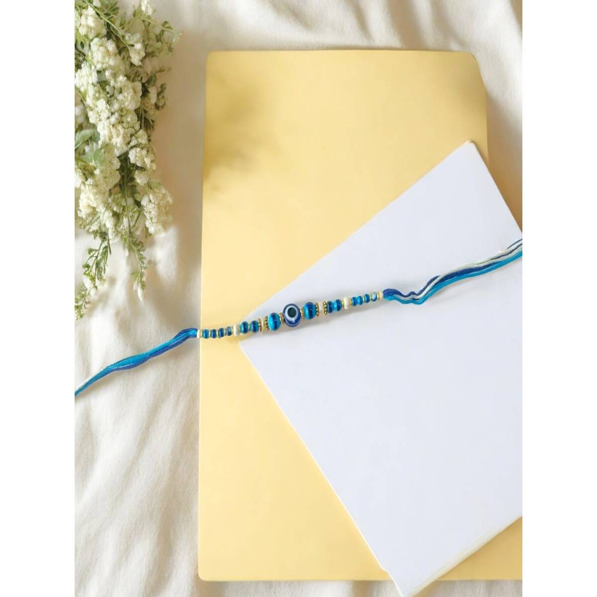 Accessher Evil Eye Blue Rakhi Gifting with Roli Kumkum Packets & Raksha Bandhan Card