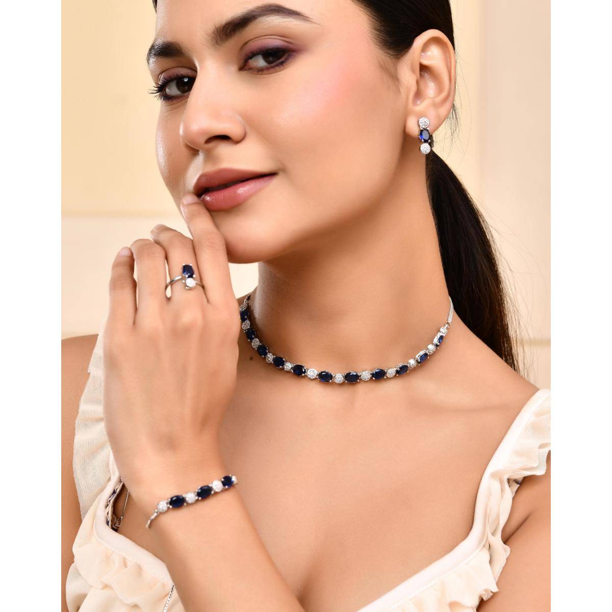 VOJ Silver Plated Blue Stone Studded Necklace Set With Ring And Bracelet