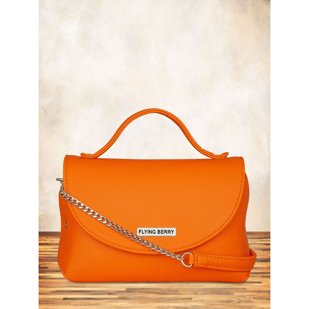 Buy Smooth orange colour sling bag Online  Odette