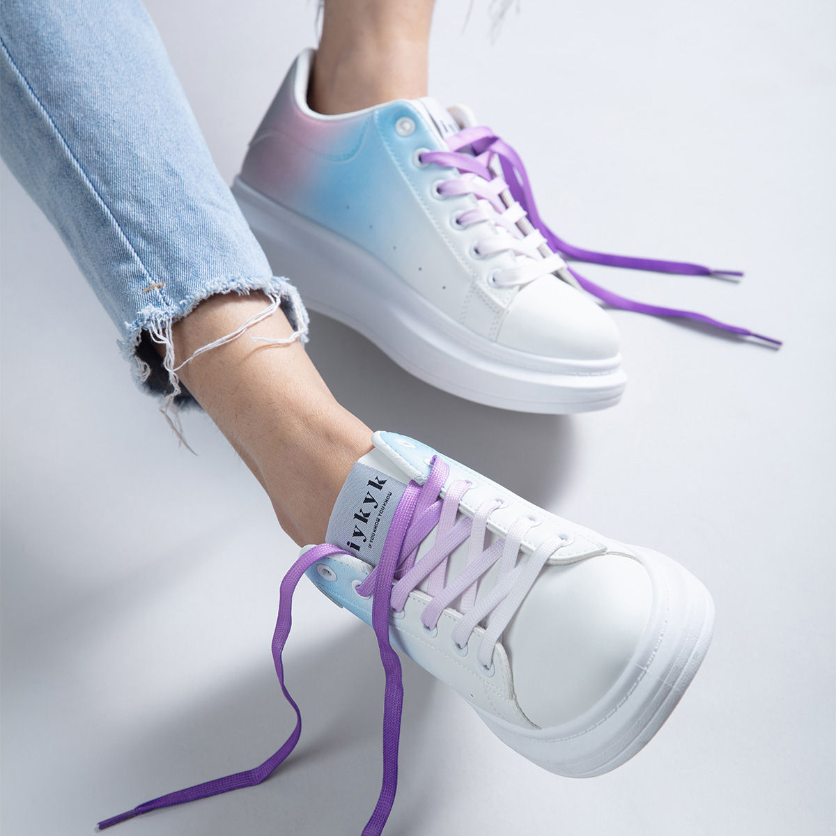 purple designer sneakers