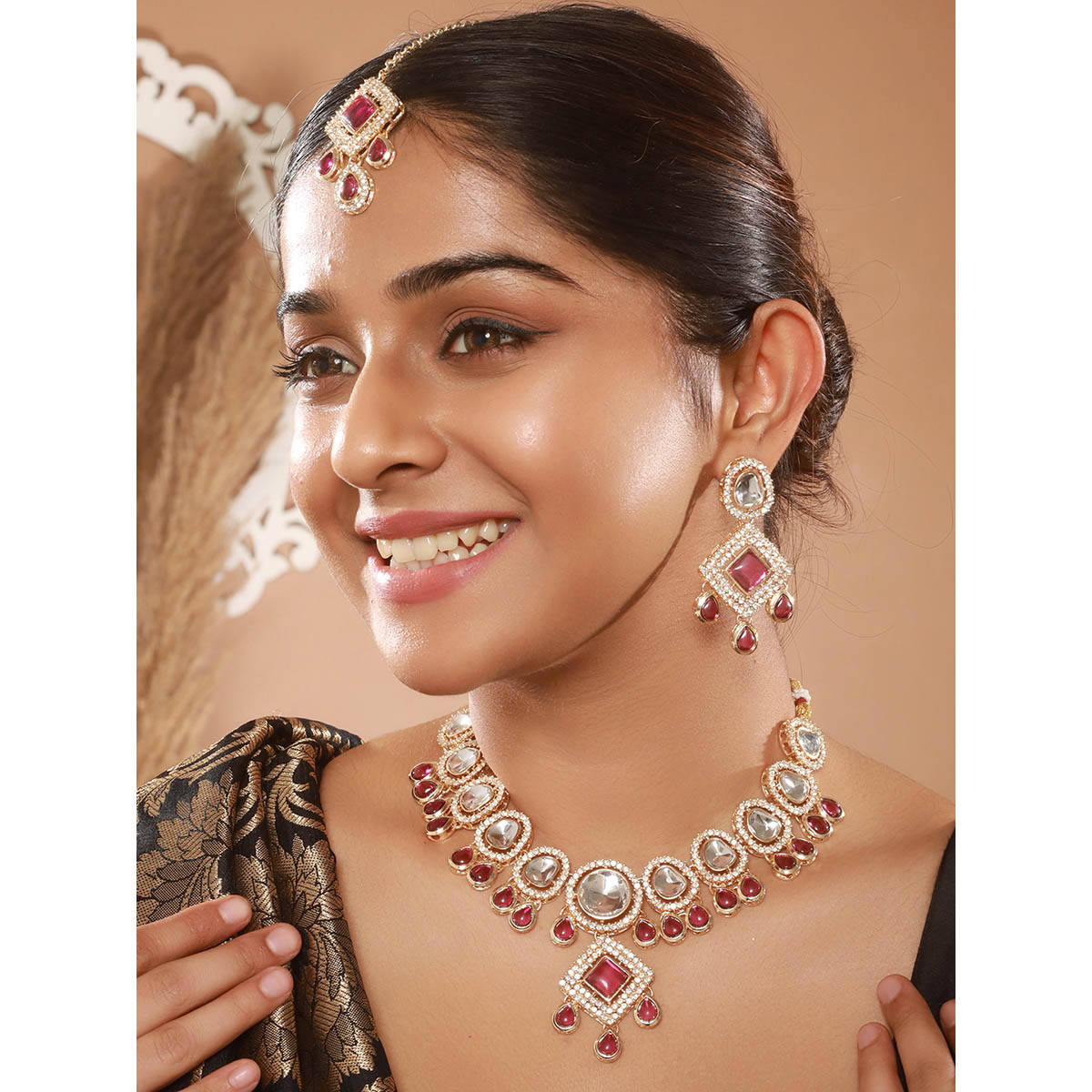 Aatmana Gold Plated Pink Kundan Studded and Beaded Jewellery Set with Maangtikka