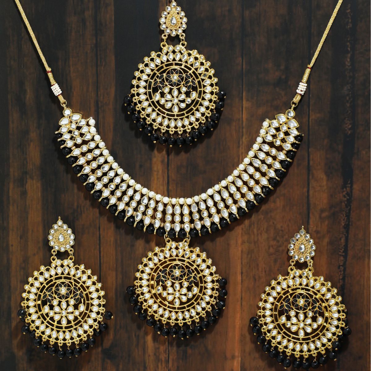 Geometric kolhapuri necklace and floral earring  set of two by Binnis  Wardrobe  The Secret Label