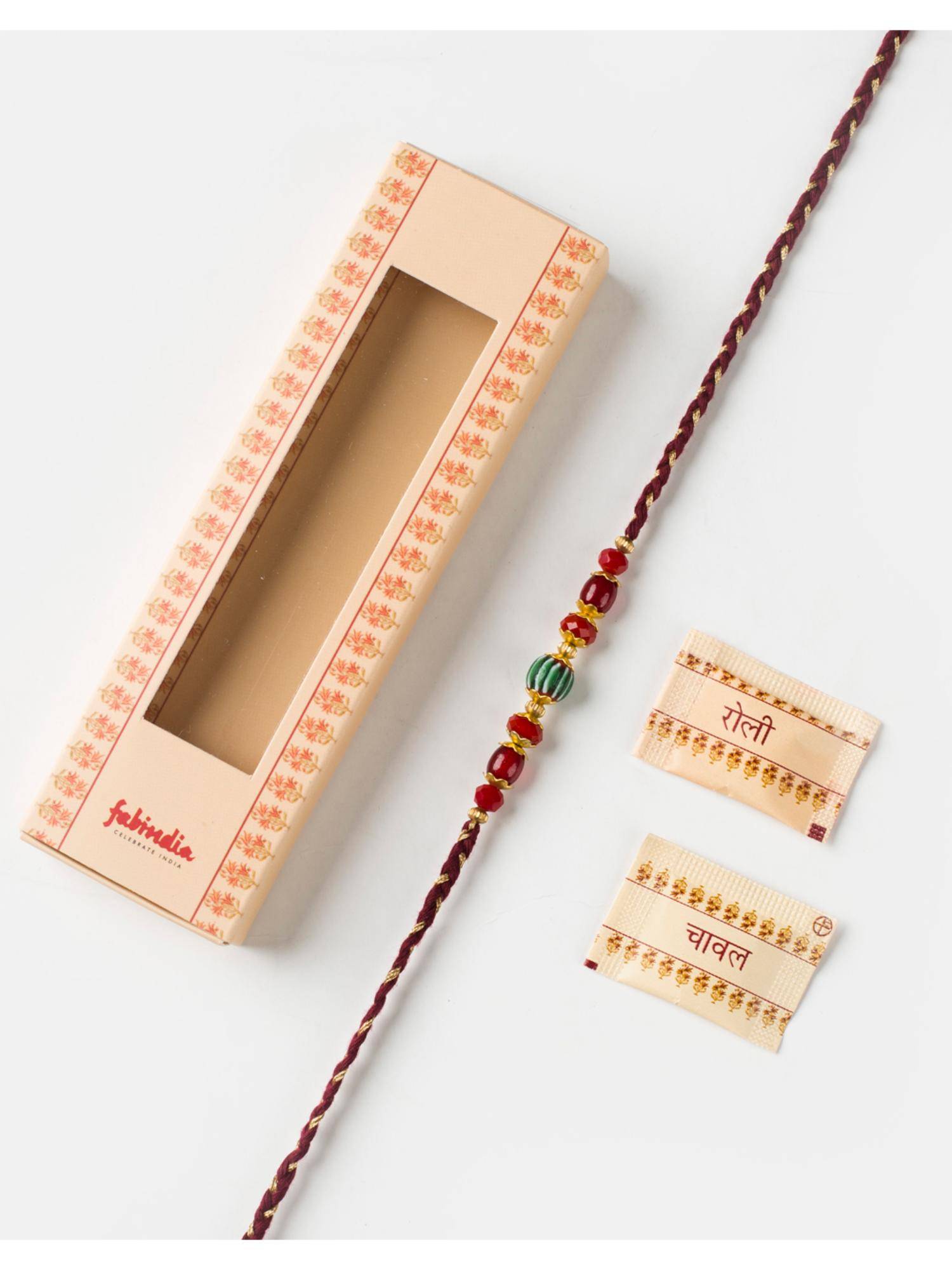 Fabindia Women Multi-Color Thread Rakhi with Roli Chawal