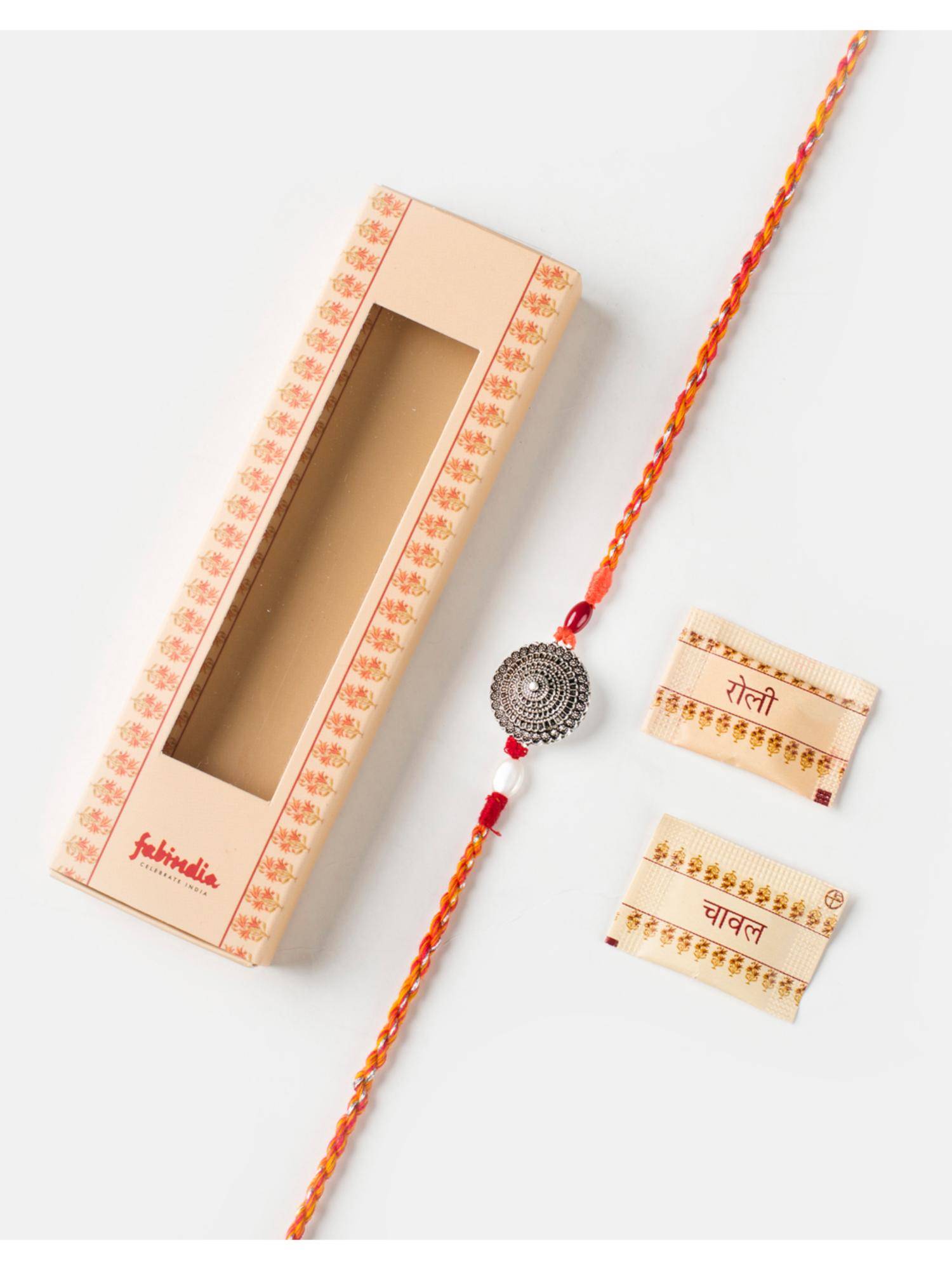Fabindia Women Silver Thread Rakhi with Roli Chawal
