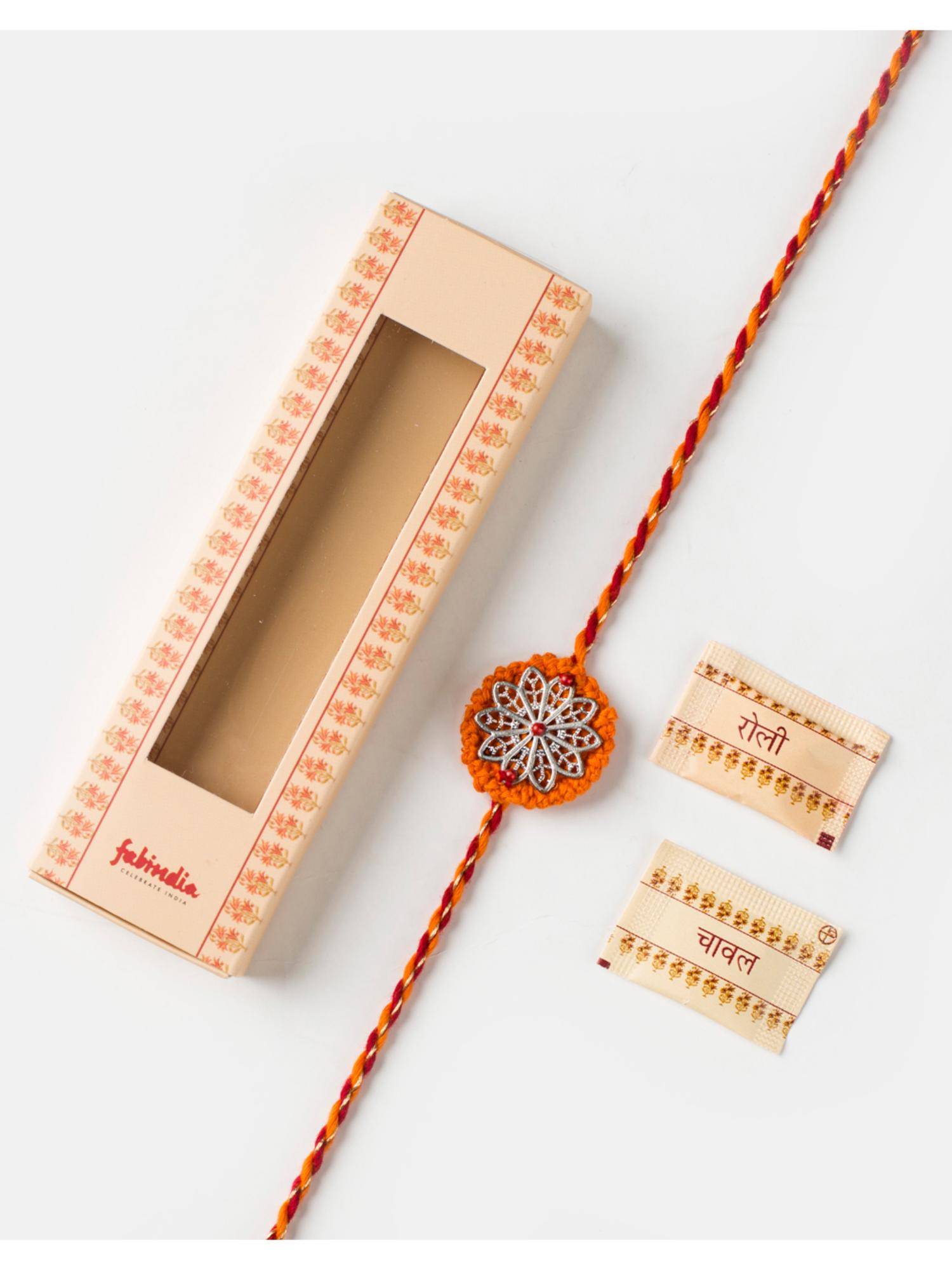 Fabindia Women Multi-Color Floral Thread Rakhi with Roli Chawal