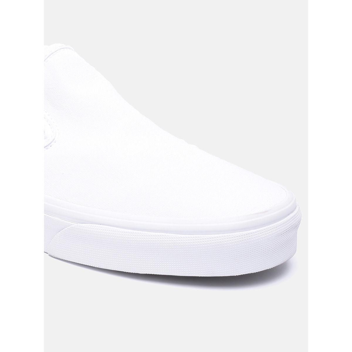 All white deals slip on vans