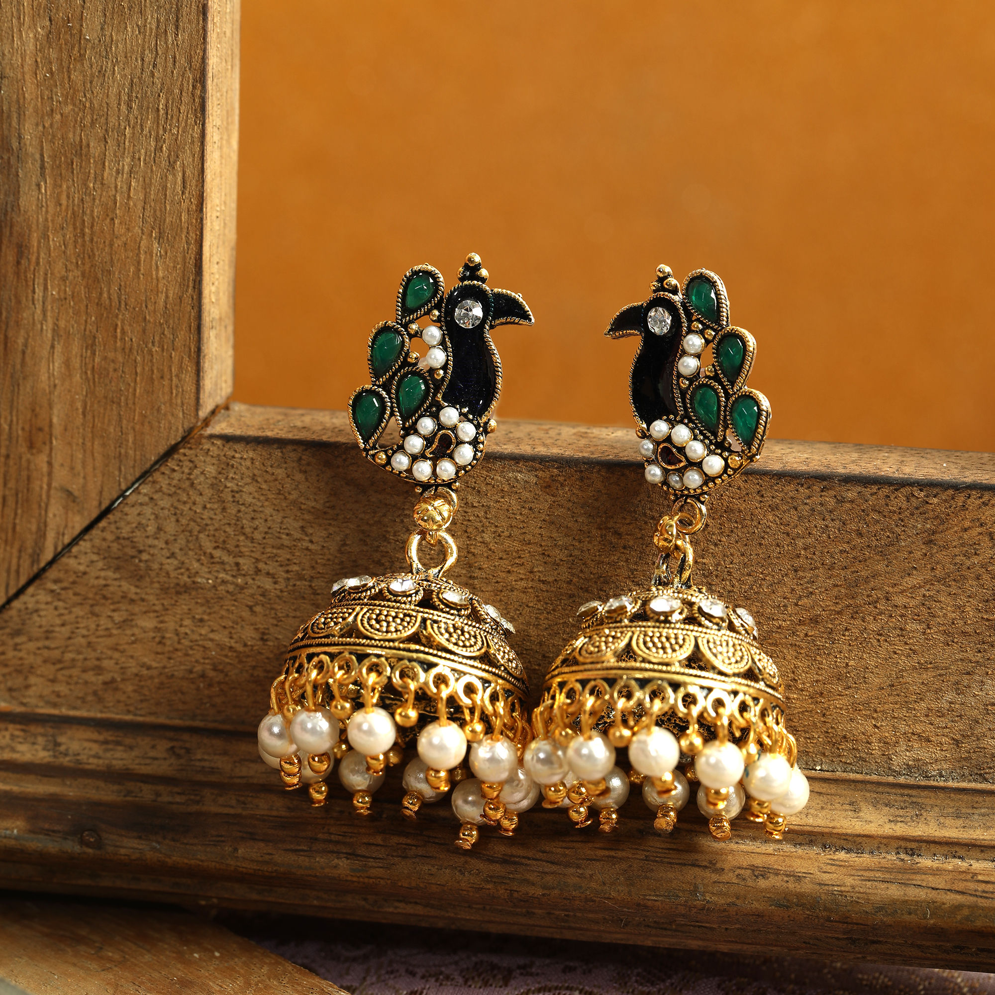 Buy Anika s Creations Gold Plated Dark Green Stone Studded Peacock Jhumka Online