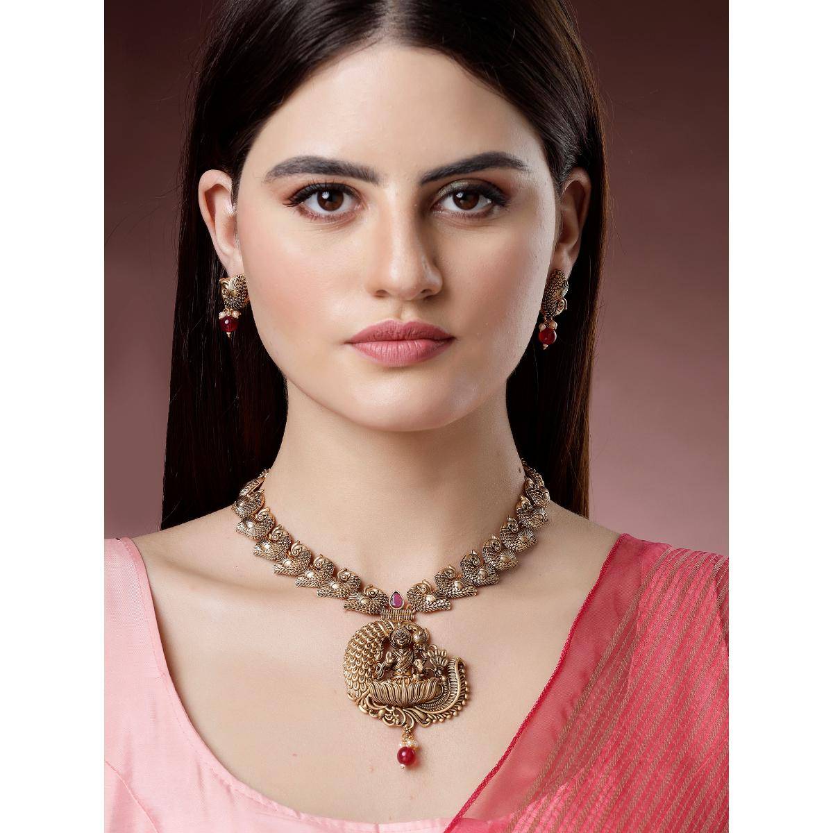 Karatcart Graceful Gold Plated Red Bead Laxmi Mata On Peacock Long Temple Jewellery Set for Women