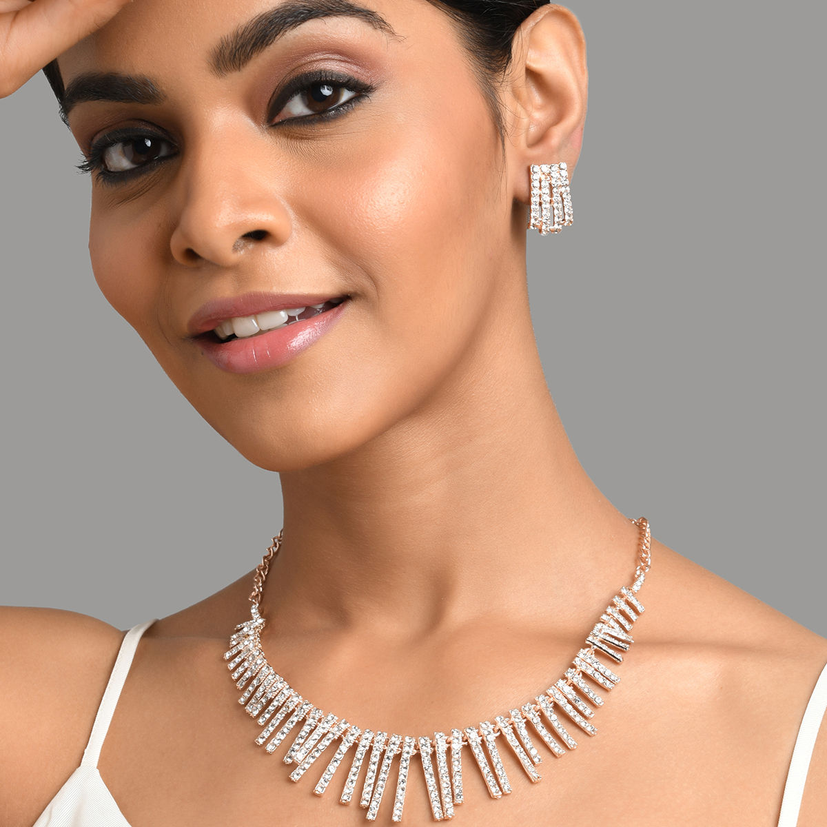 Fida Luxurious GoldPlated Geometrical American Diamond Jewellery Set