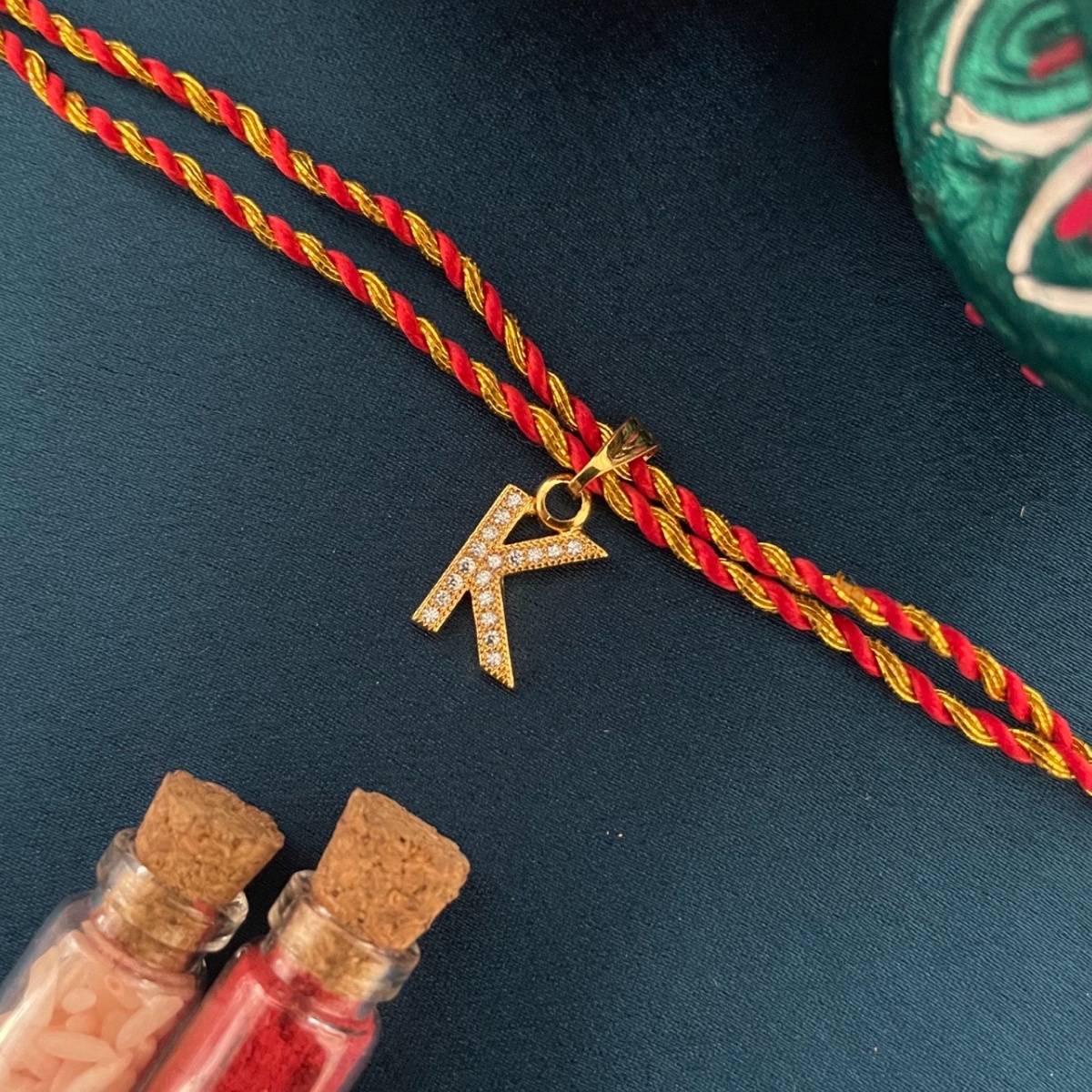 Digital Dress Room Gold K Letter Ad Red Thread Rakhi