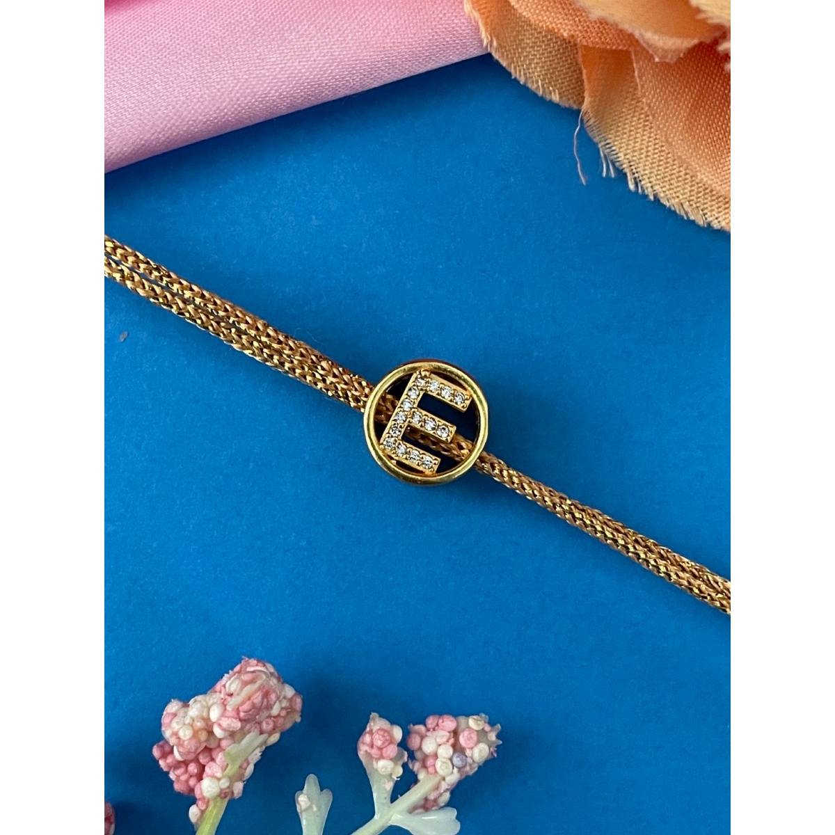 Digital Dress Room Gold E Letter Round Ad Thread Rakhi