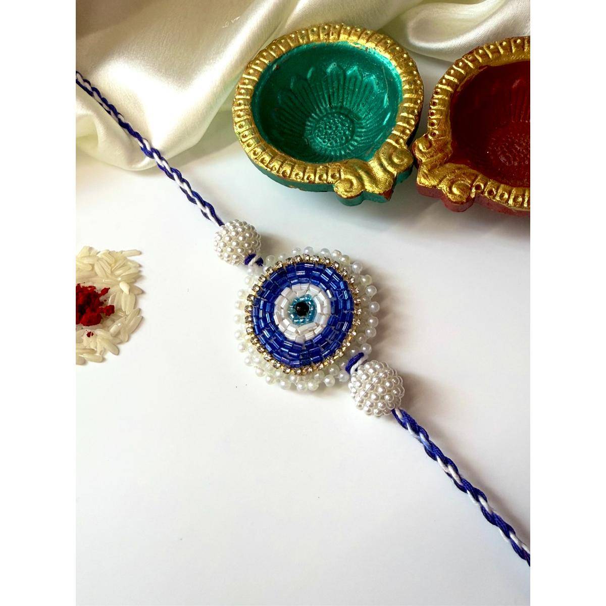 ISHKAARA Pearl Evil Eye Rakhi with Roli Chawal