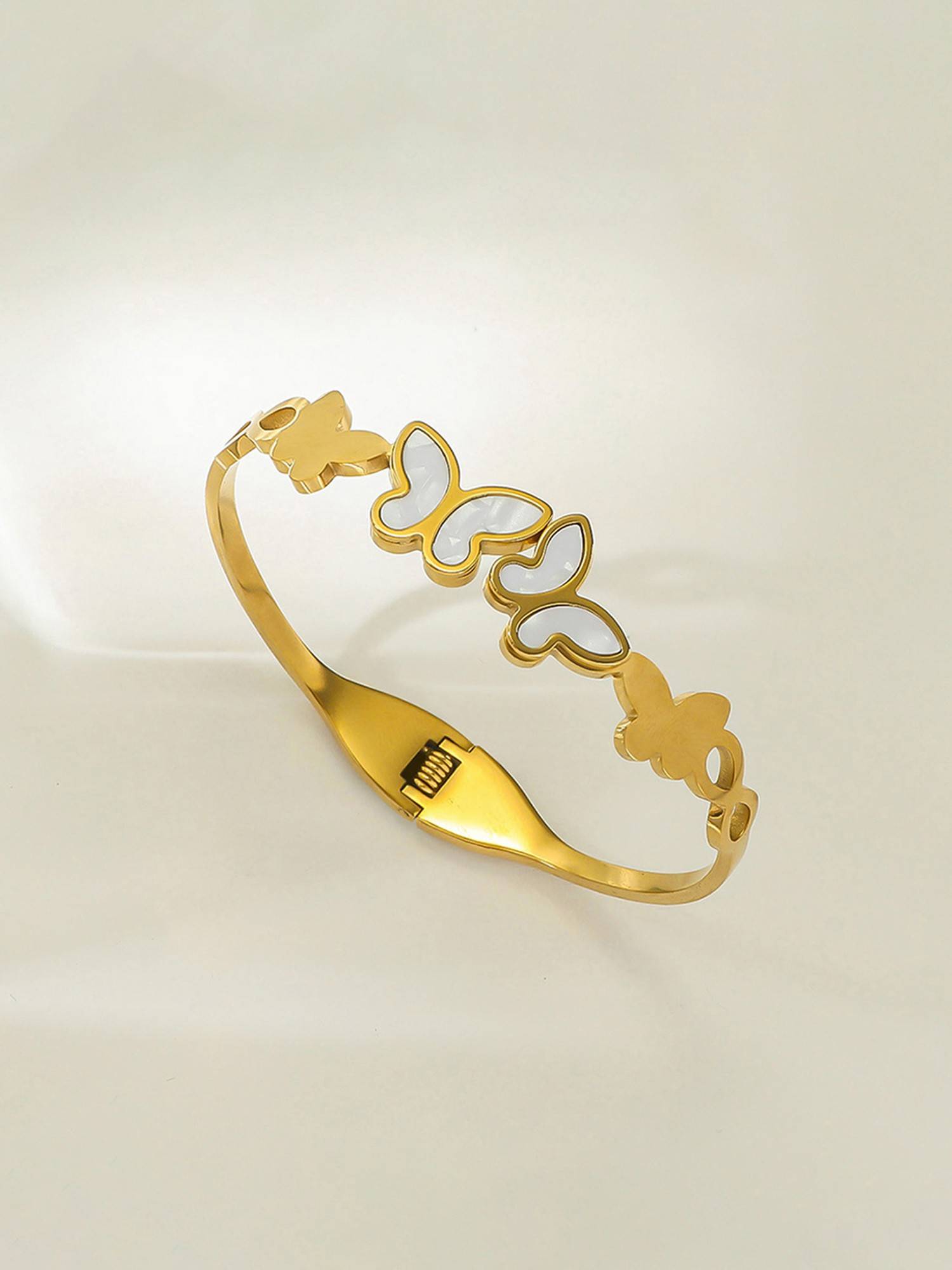 Designs & You White Gold Plated Butterfly Themed Anti Tarnish Bangle Style Bracelet