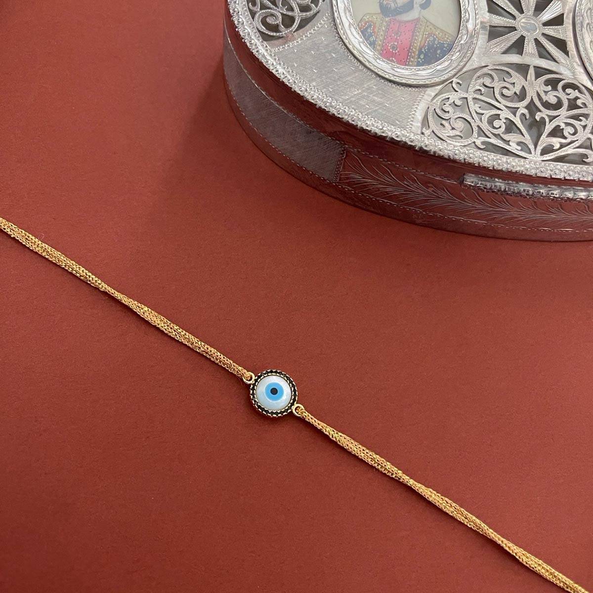 Digital Dress Room American Diamond Rakhi Round Evil Eye Charm Creamish Yellow Thread Rakhi