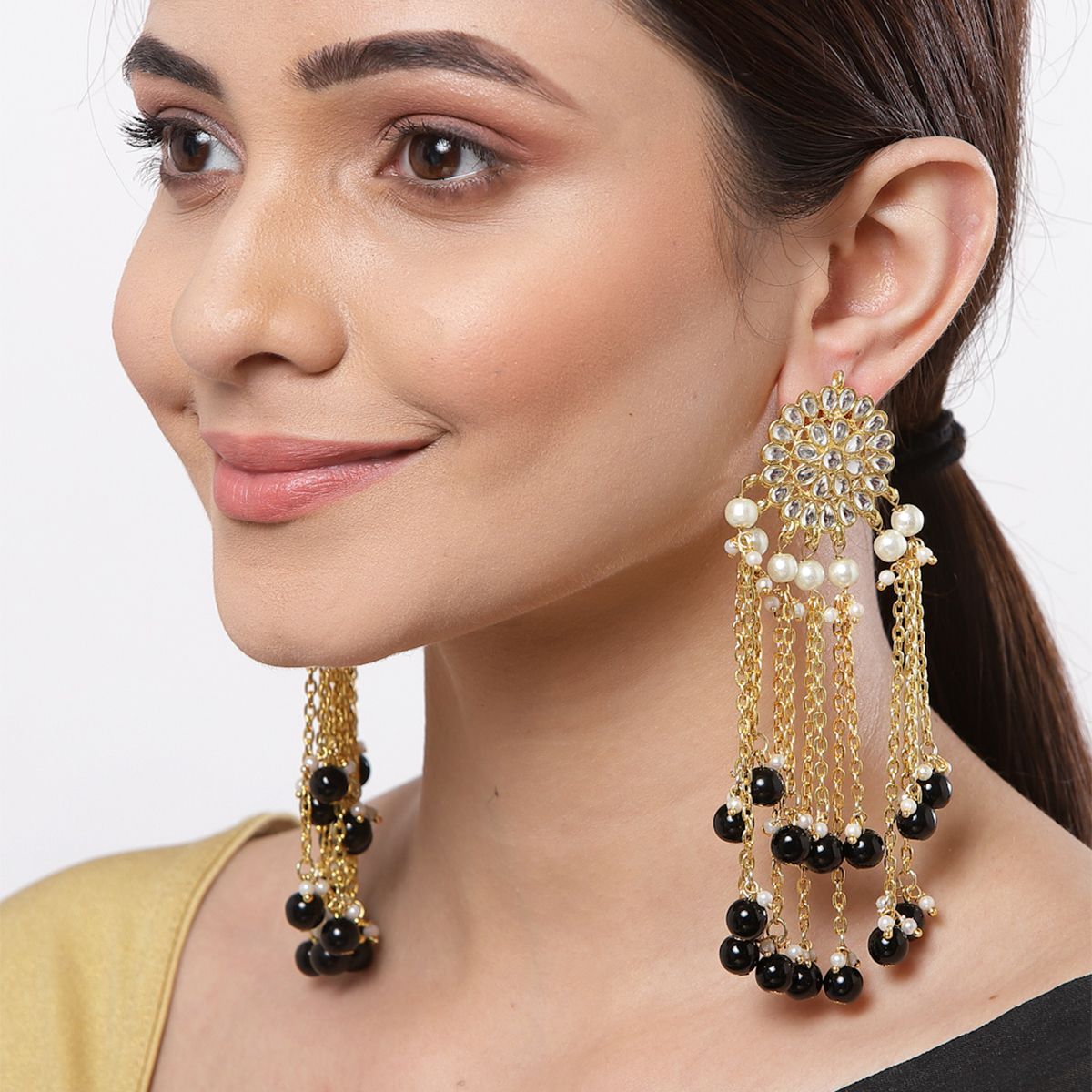 Karatcart Gold Plated Black Kundan Tassel Earrings Buy Karatcart Gold