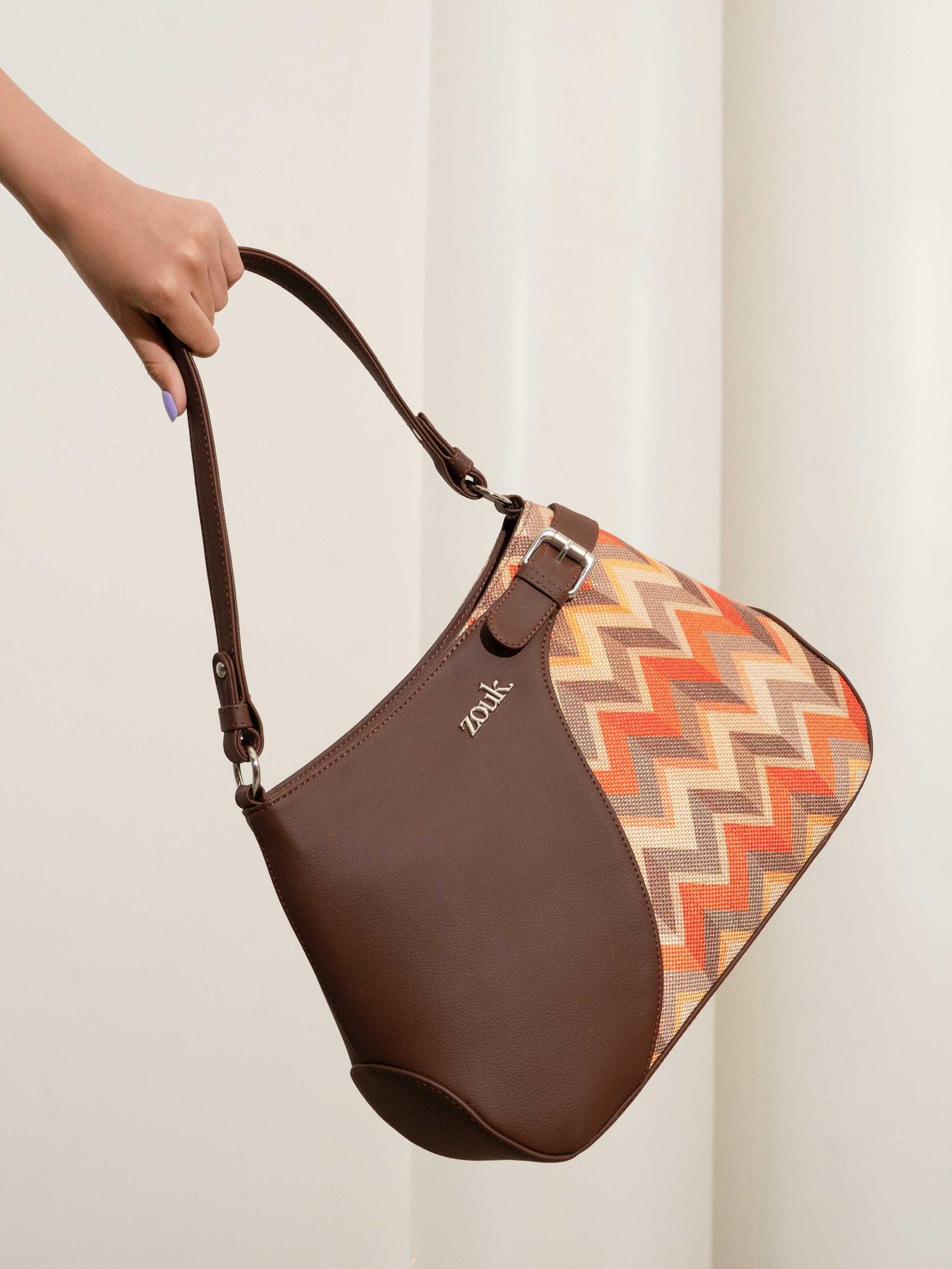Buy Zouk Women Orange Tidal Wave Ira Handbag Online