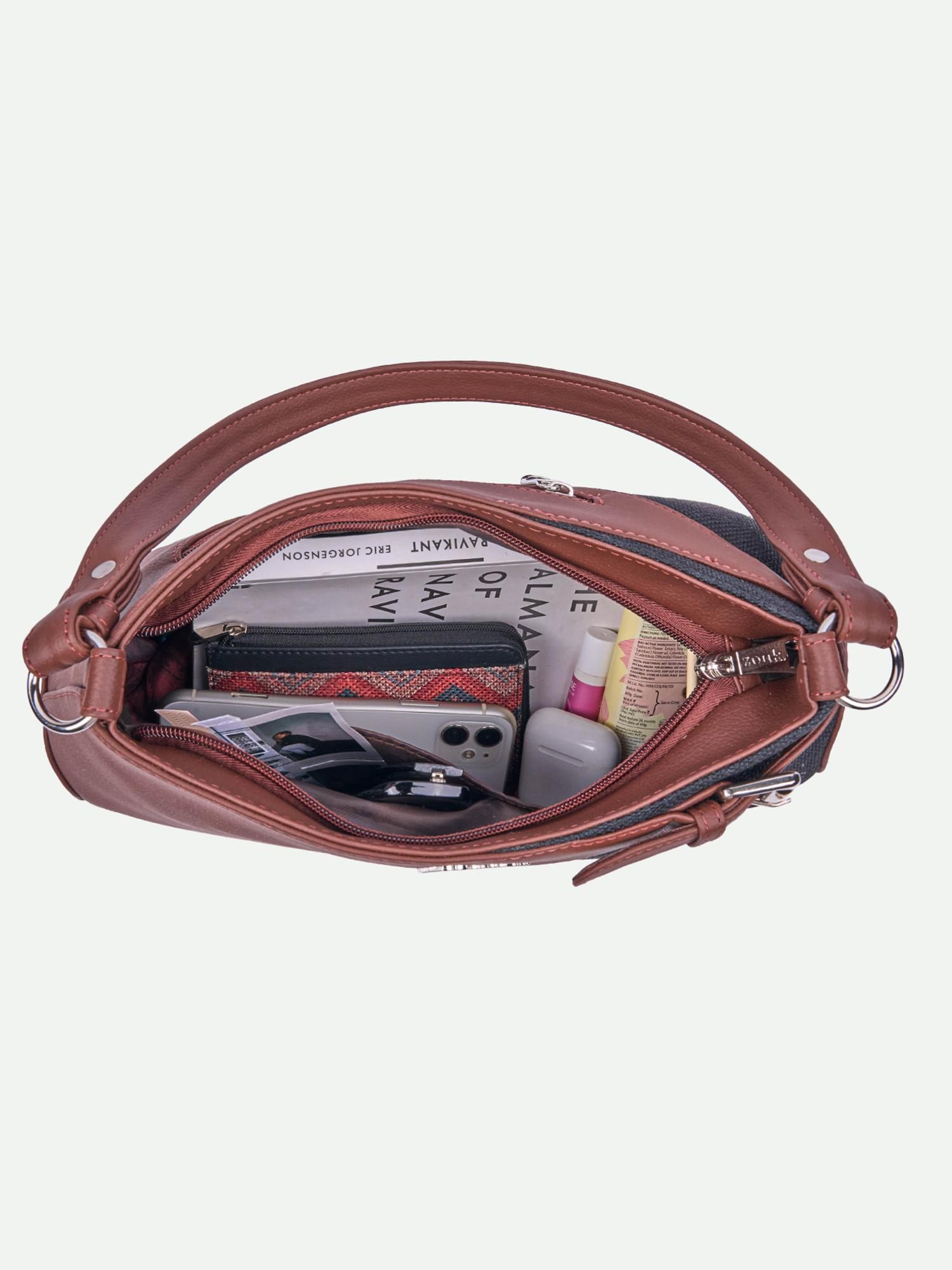 Buy Zouk Women Orange Tidal Wave Ira Handbag Online