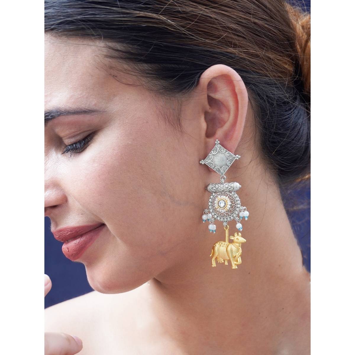 Niscka Nandi-Themed Oxidized Gold-Plated Earrings