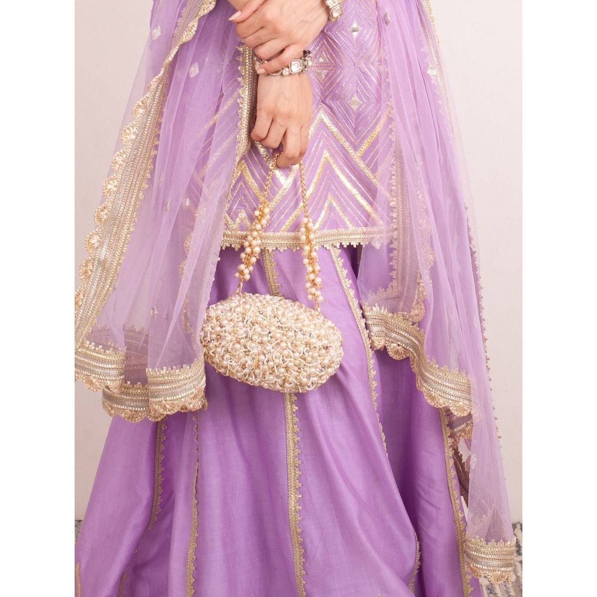 FOREVER NOOR Zuri Oval Clutch