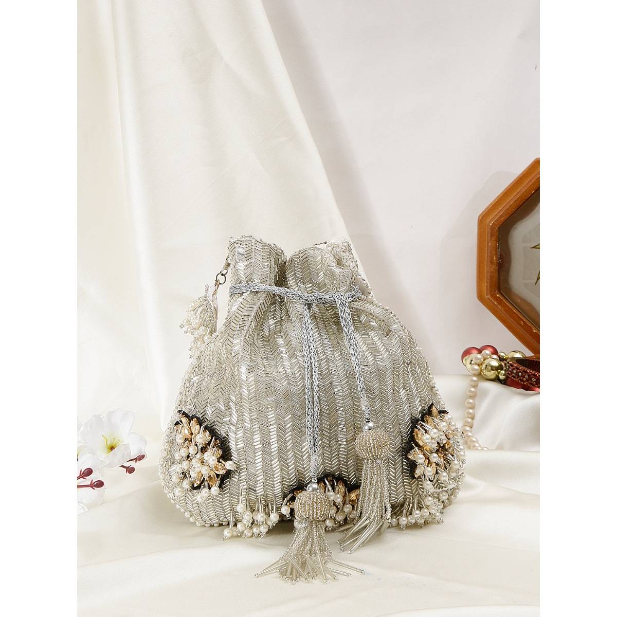 SWISNI Elegant Silver With Flower Design Embellishment Potli (S)