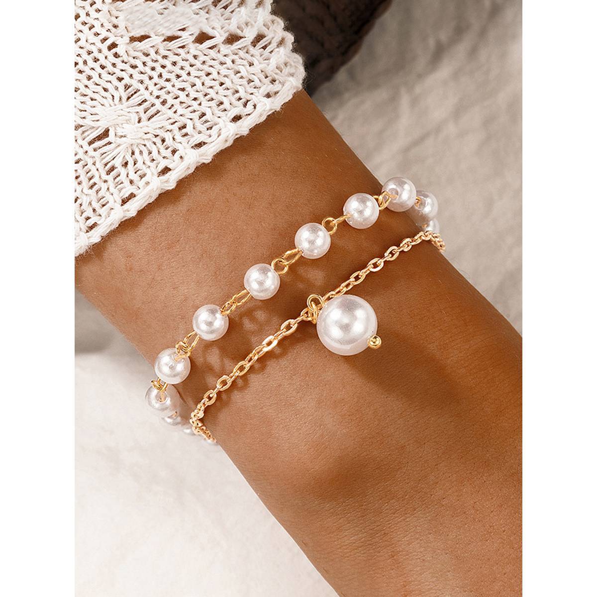 Jewels Galaxy Gold Plated Pearl Studded Dual-Strand Bracelet