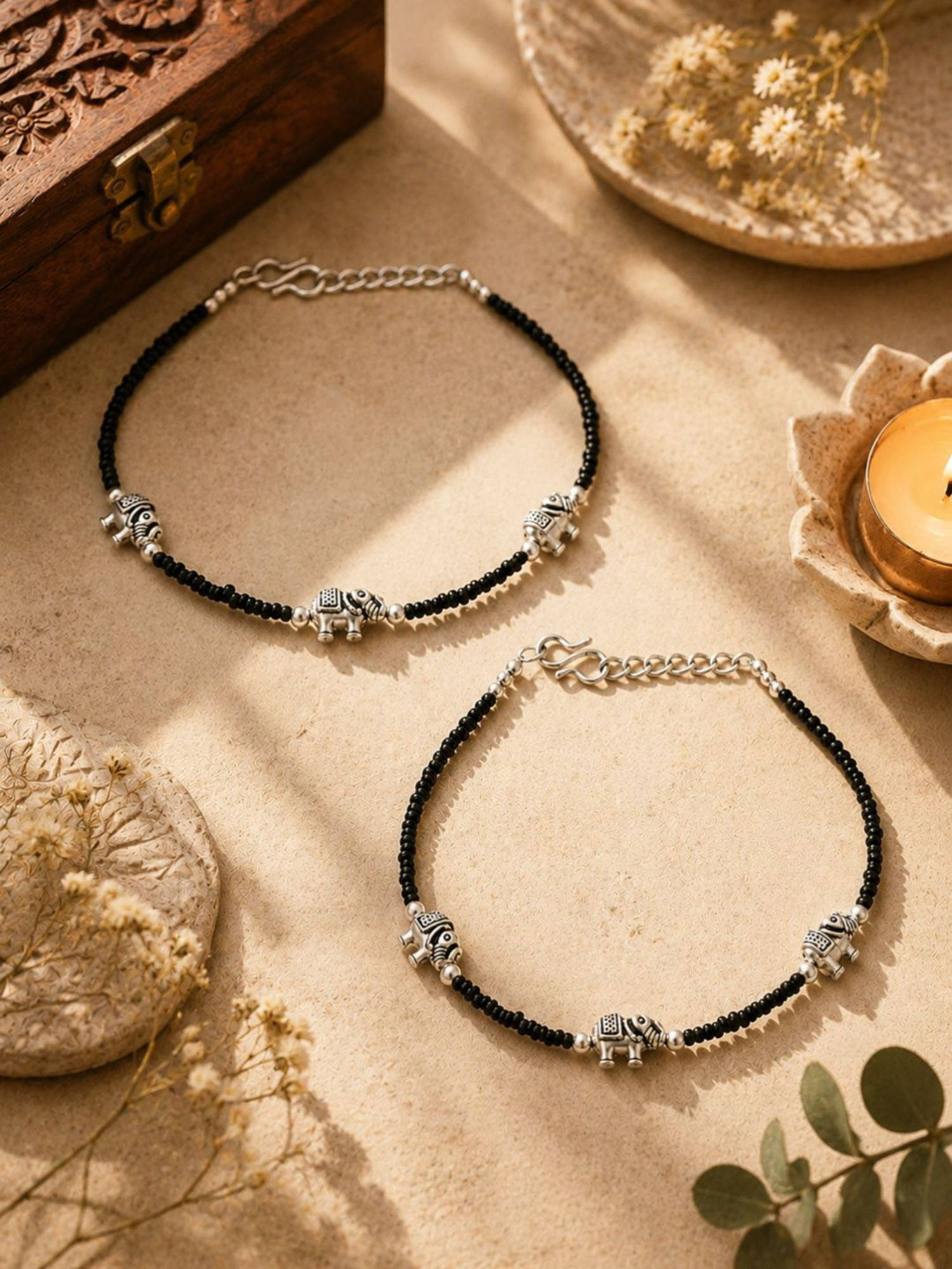VIRAASI Silver Plated Black Beads Elephant Design Charm Anklets Pair