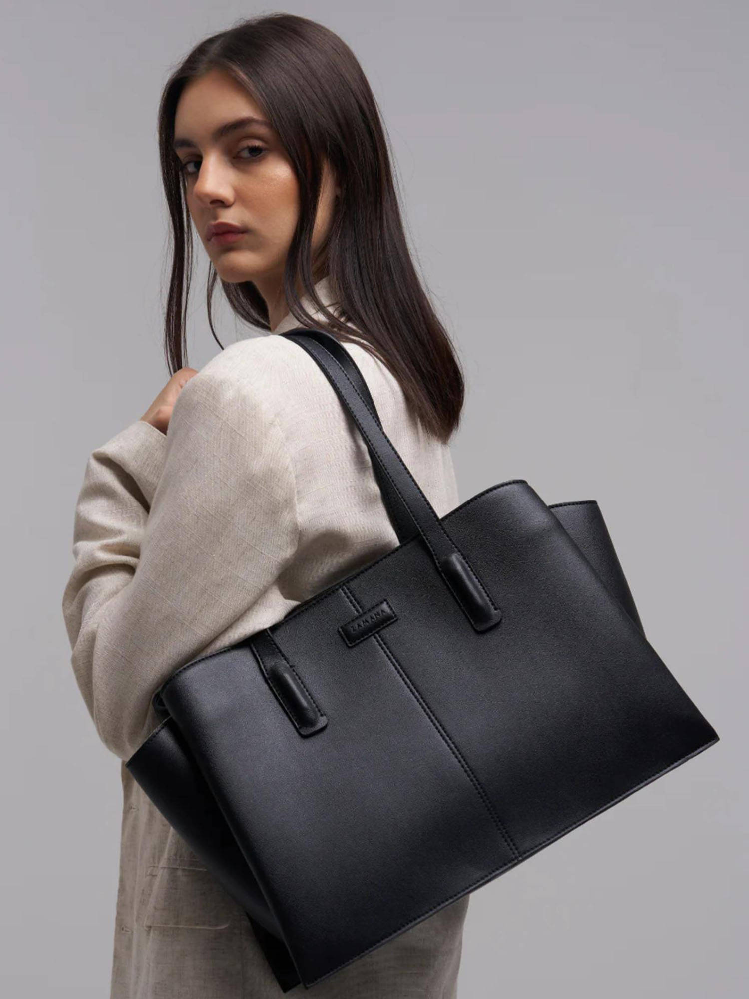 Buy ZAMANA Women Black Leather Solid Handbag Online