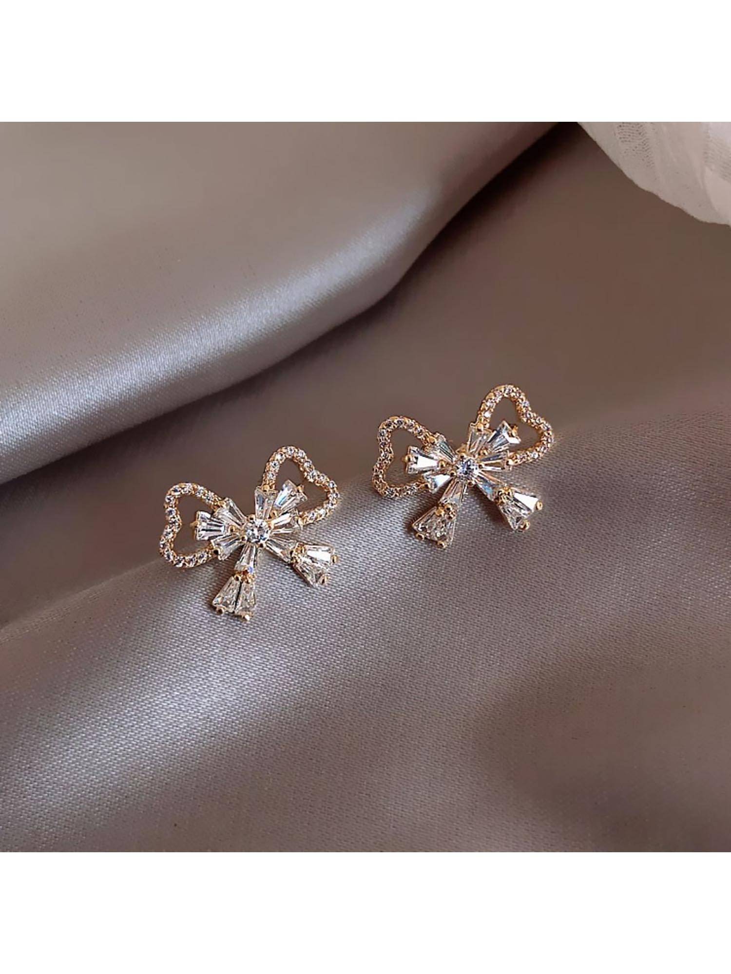 ESTAILO FASHION White Pavac Ribbon Studs Earrings