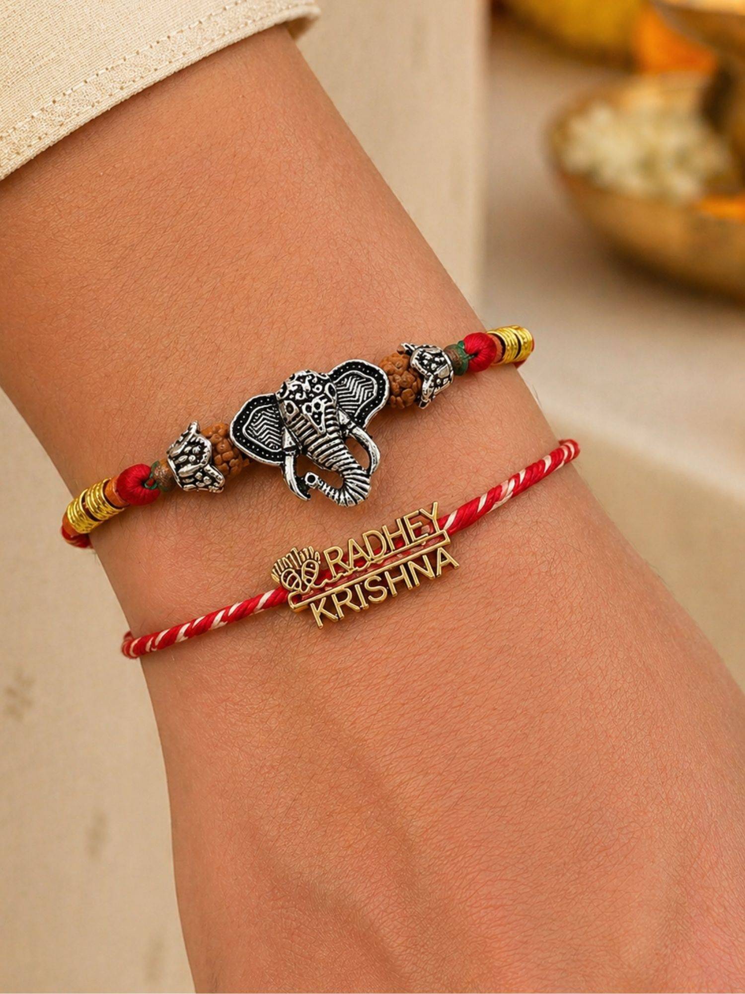 Digital Dress Room Ganesh and Radhey Krishna Rakhis (Pack of 2)