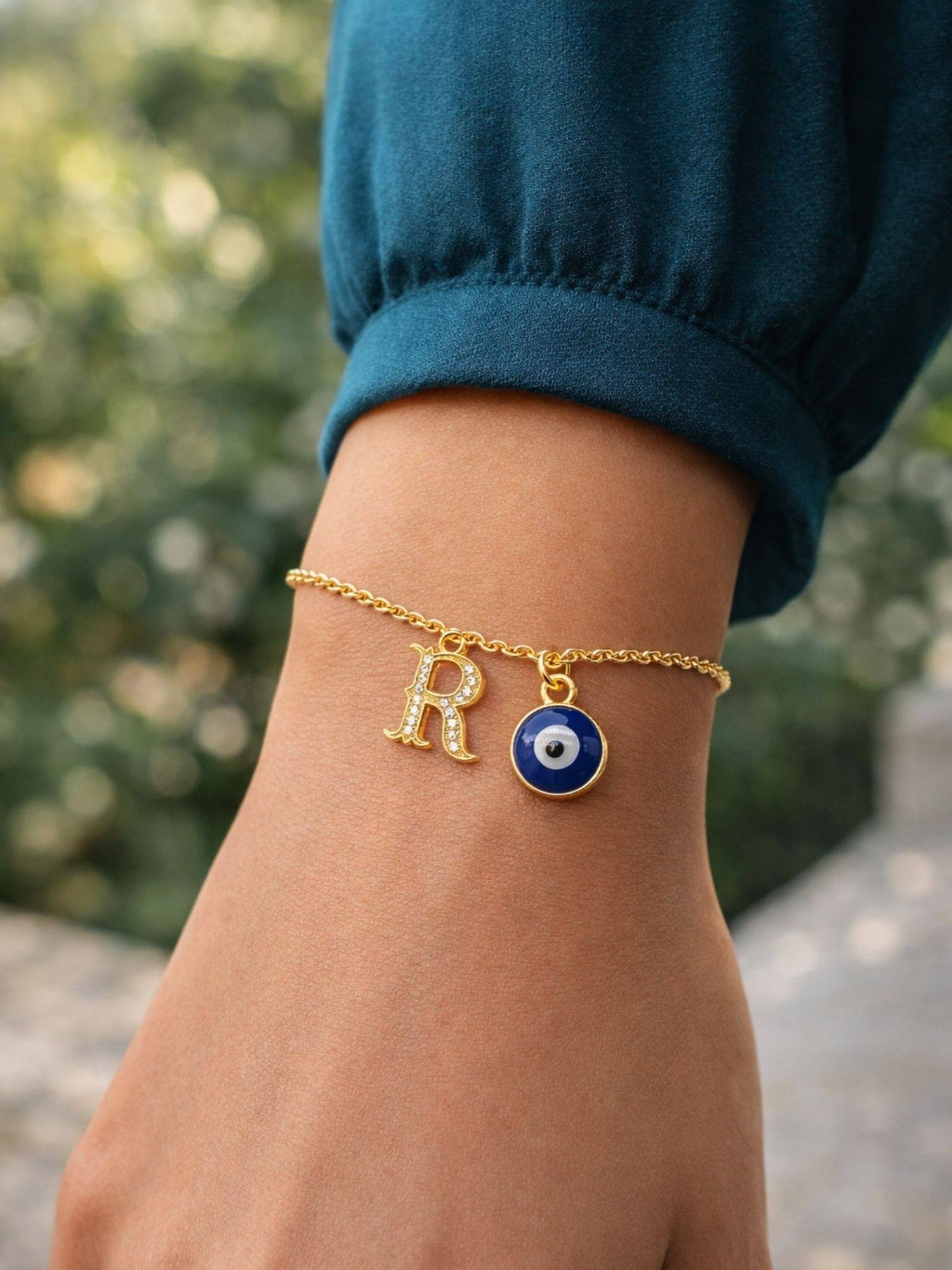 Digital Dress Room R Initial Evil Eye Stone Studded Bracelet Rakhi
