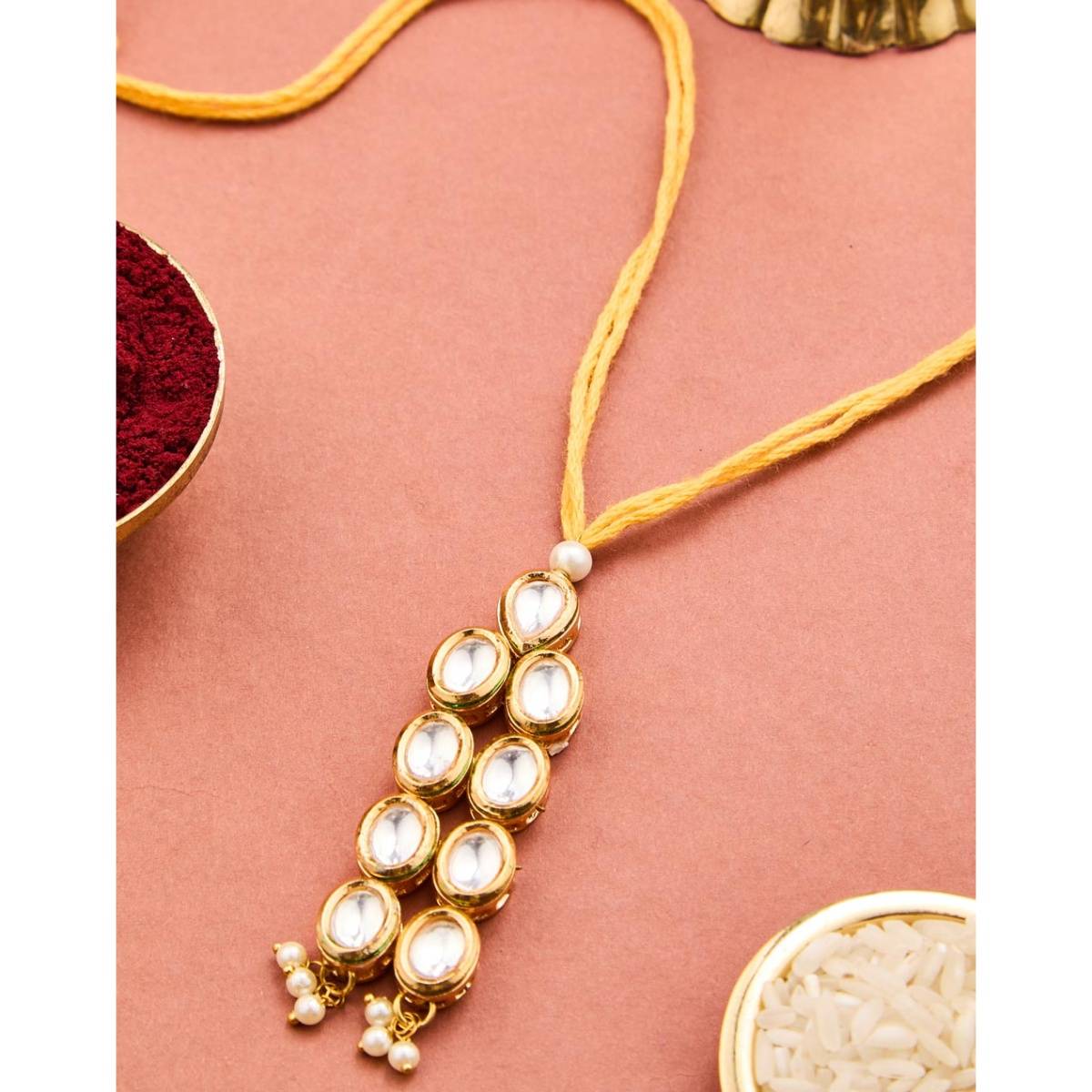 Fabindia Yellow Metal Kundan Lumba with Roli Chawal