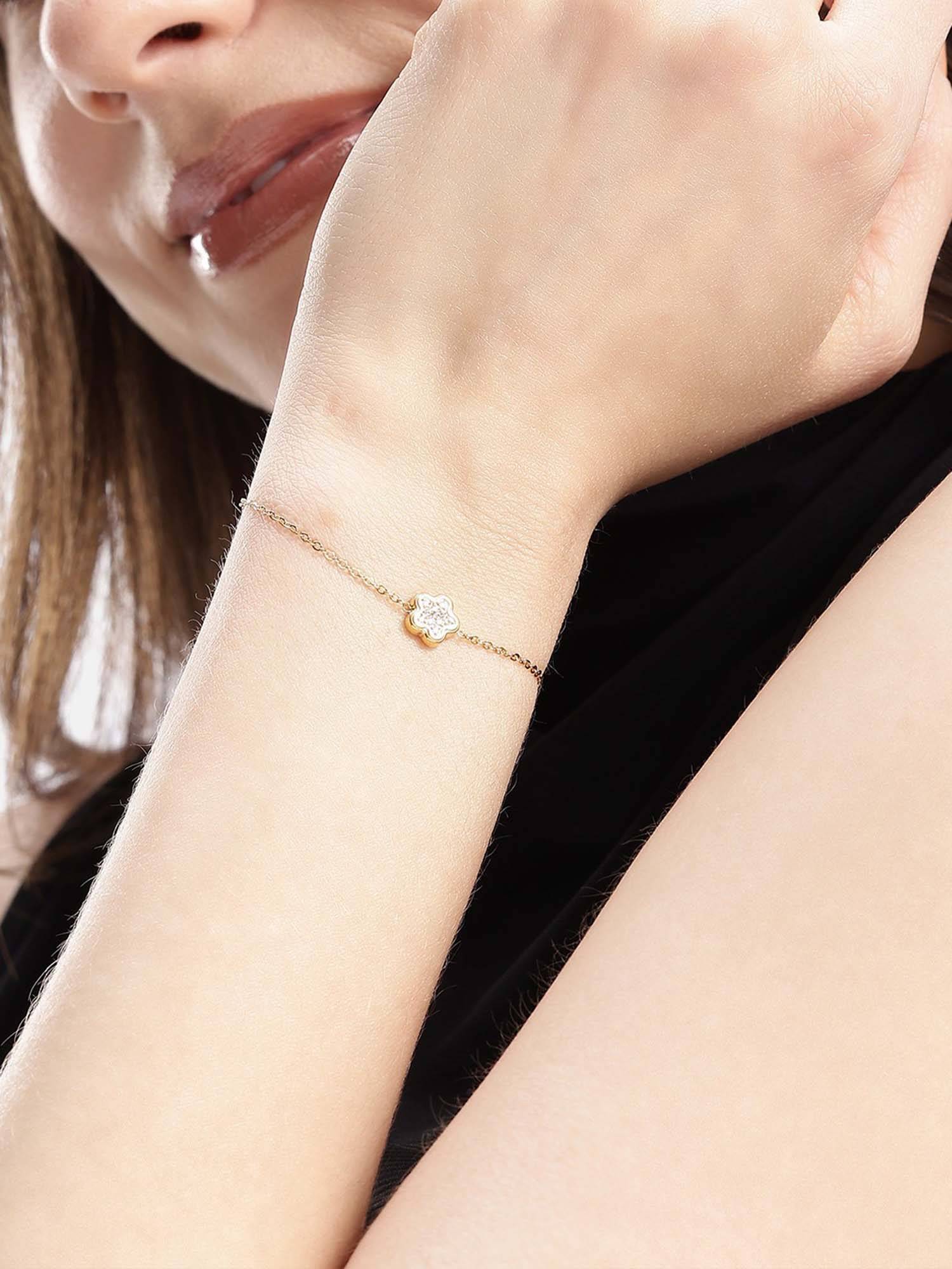 Buy Carlton London Women 18Kt Gold Plated Cz Floral Charm Adjustable ...