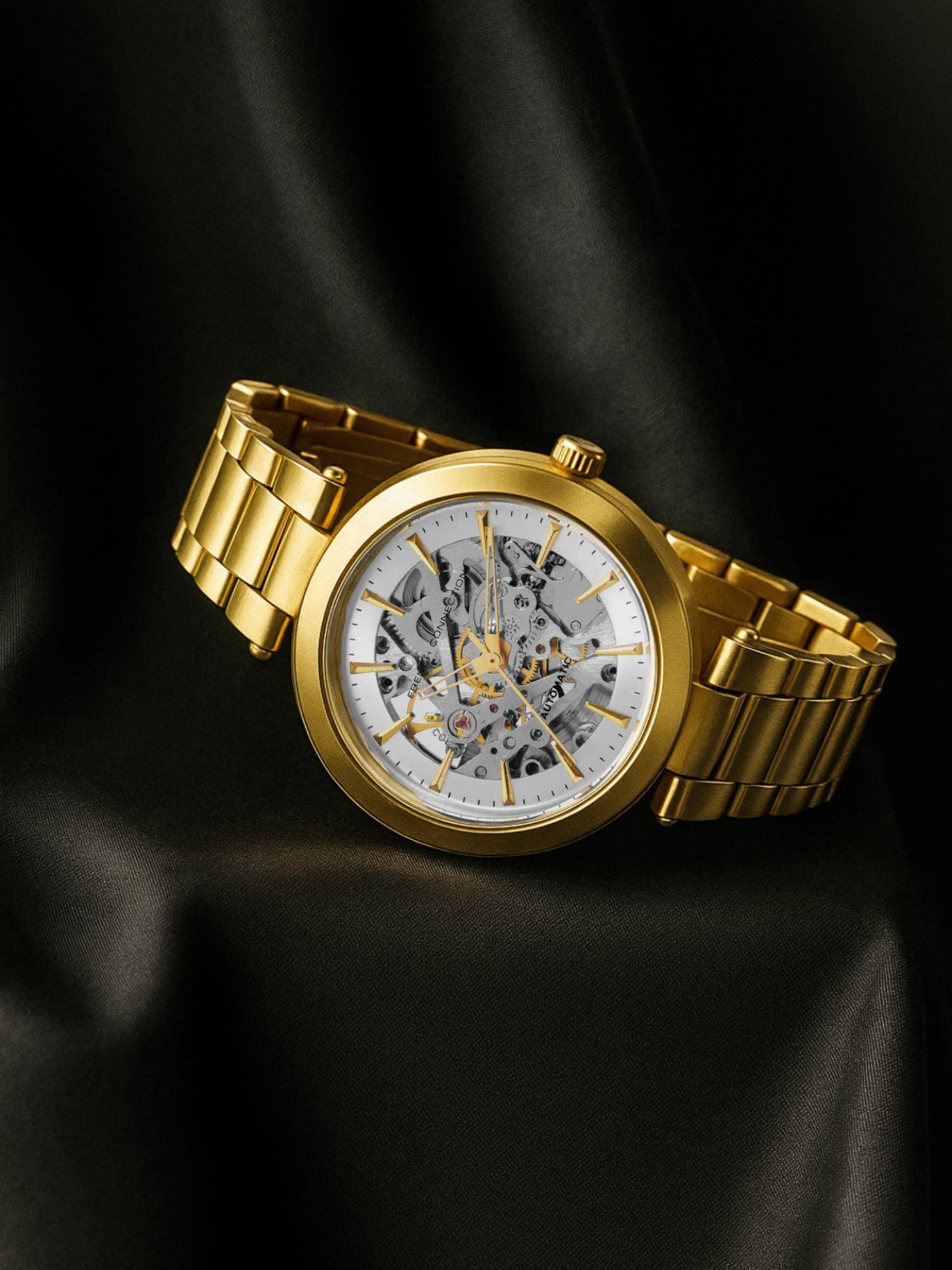 French Connection MODERN Silver SEE THROUGH Round Dial Analog Watch for Women - Gold (FCA21GM) (M)