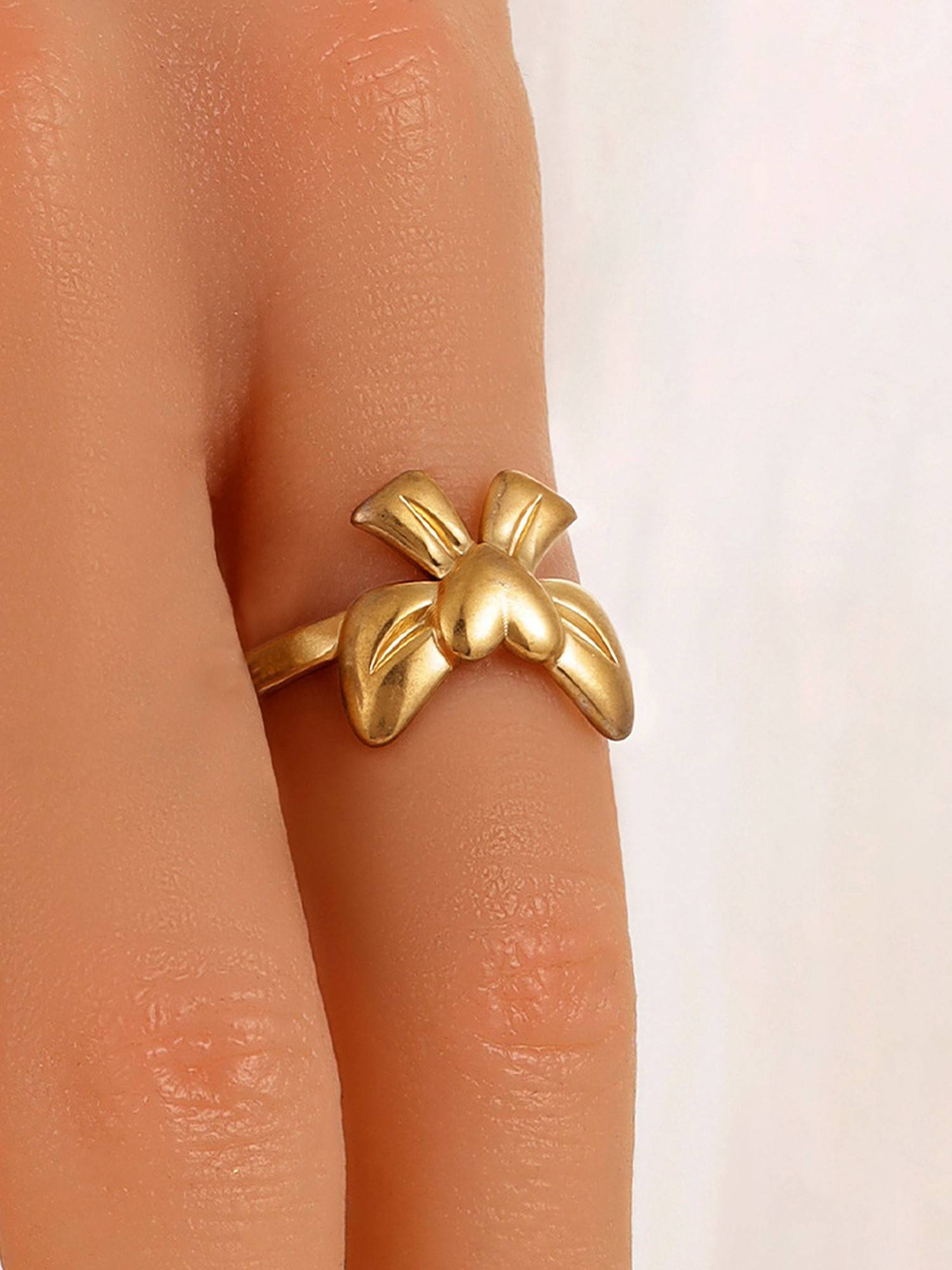 Designs & You Gold-Plated Anti Tarnish Stainless Steel Bow Themed Adjustable Ring