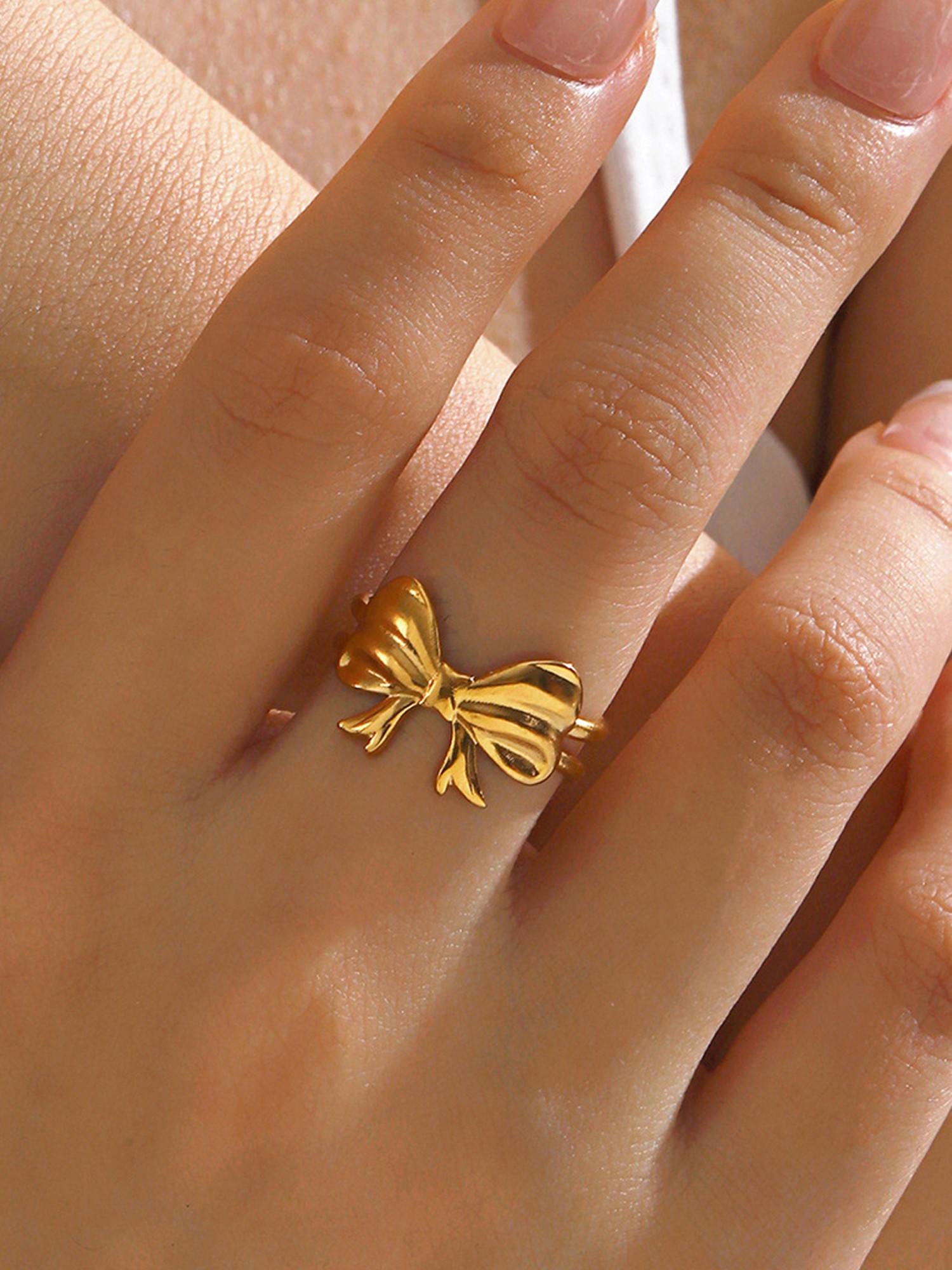 Designs & You Gold-Plated Anti Tarnish Stainless Steel Bow Themed Adjustable Ring