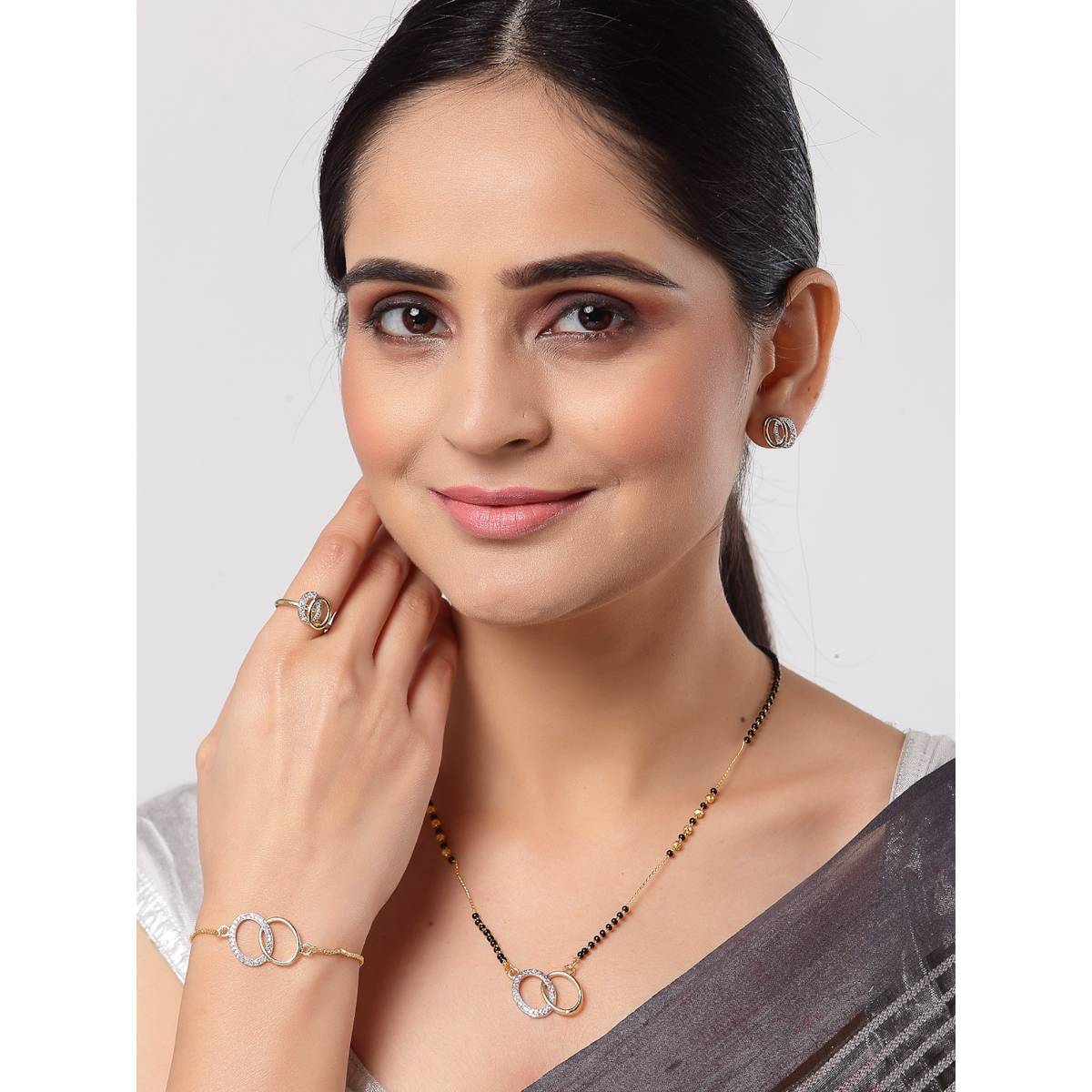 ZENEME Gold-Plated White Cz Studded Beaded Oval Shaped Mangal Sutra Combo for Women