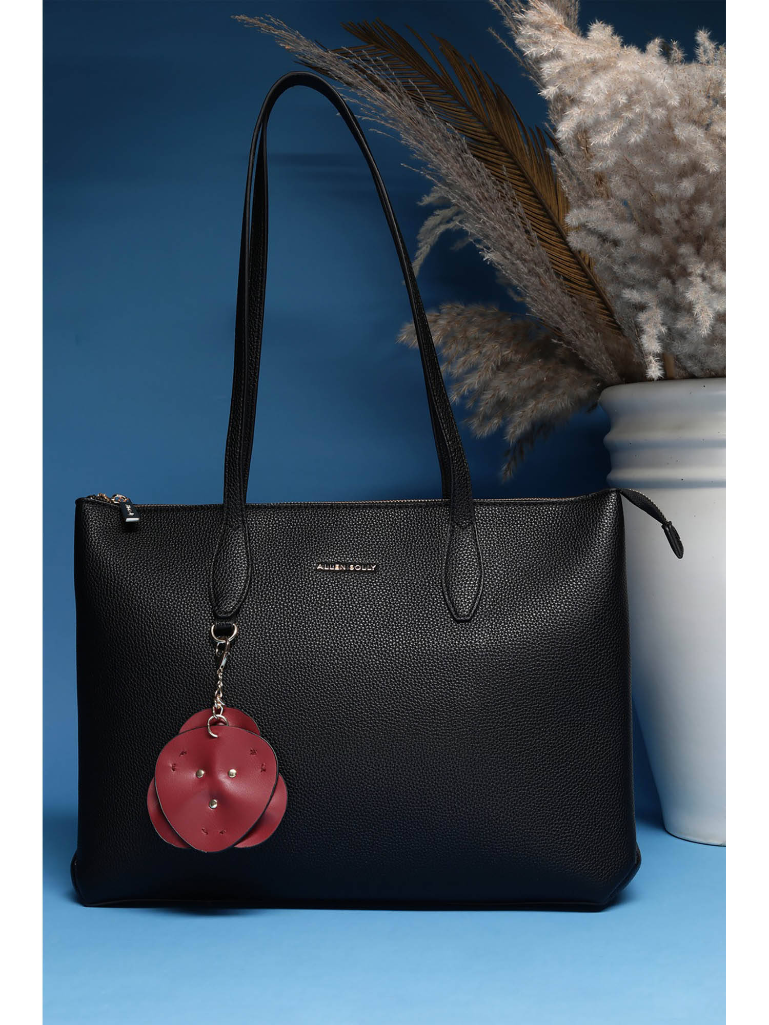 Allen Solly Women Black Textured Handbag with Key Chain