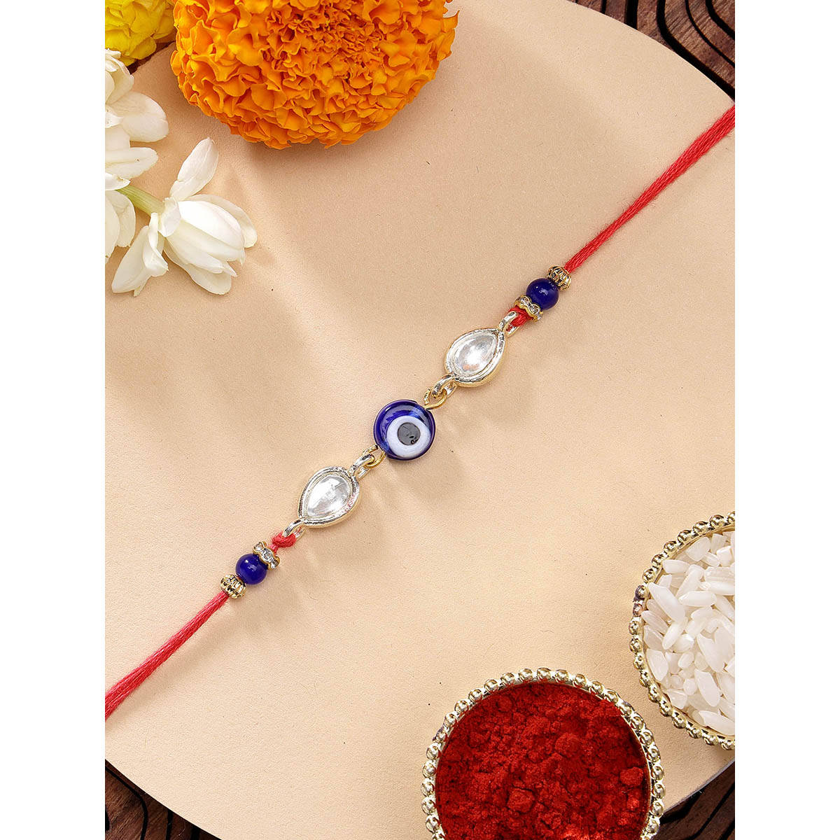 Karatcart Beautiful Evil Eye Kundan Handmade Rakhi with Roli Chawal