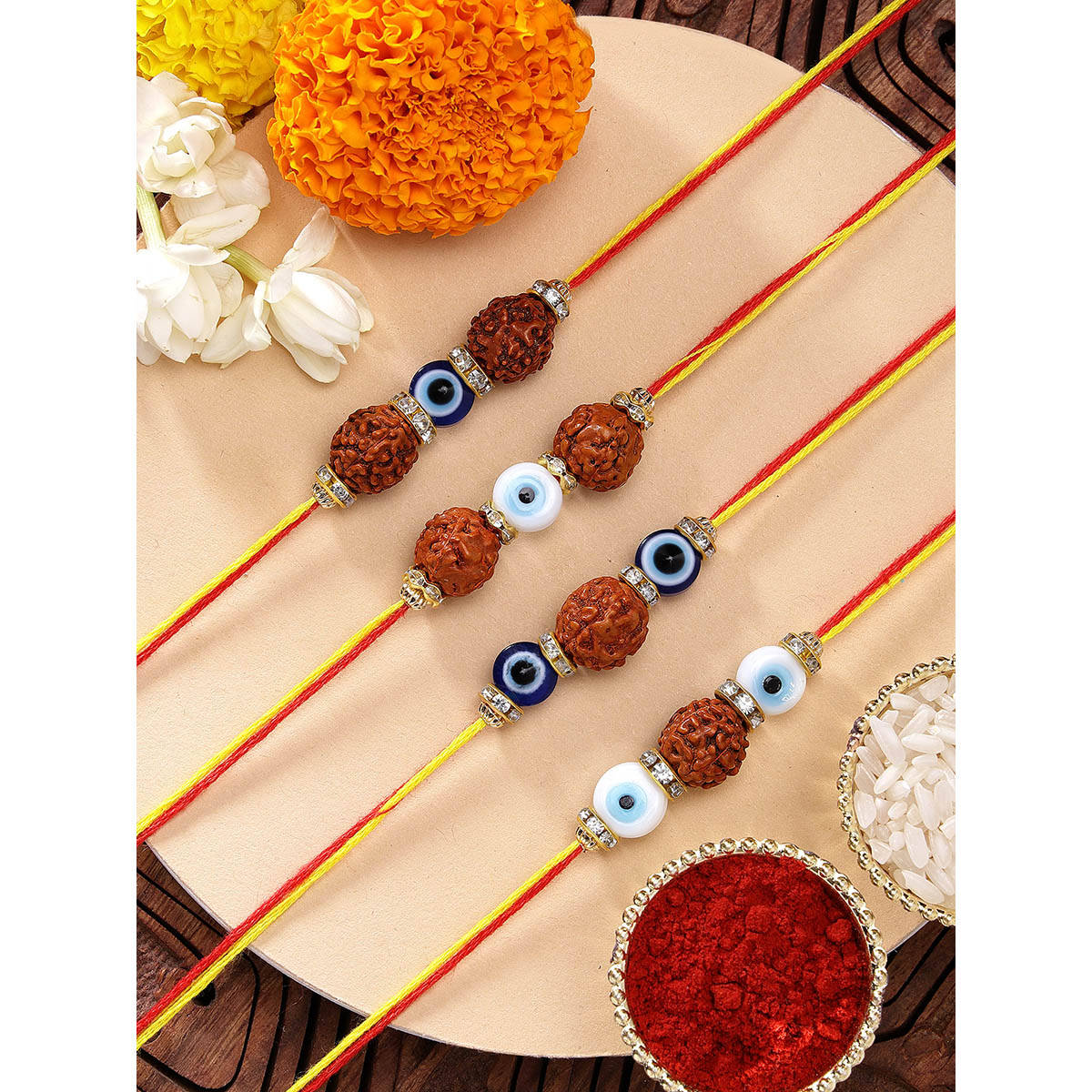 Karatcart Set Of 4 Minakaris Evil Eye Kundan Rakhi'S with Roli Chawal