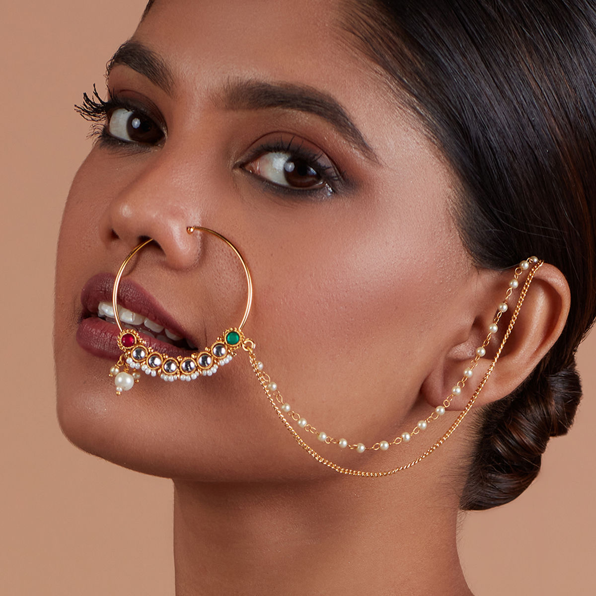 Delicate Gold Nose Pin for the Indian Bride
