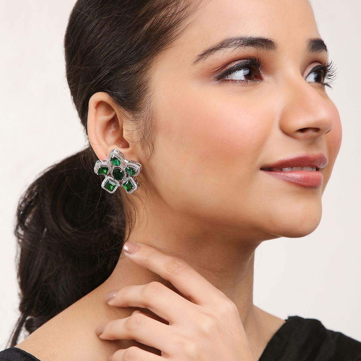 Cz studded emerald green stone drop earrings 