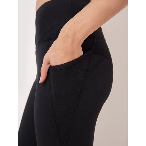 Buy Women Stretchable Flared Pants With Pockets online